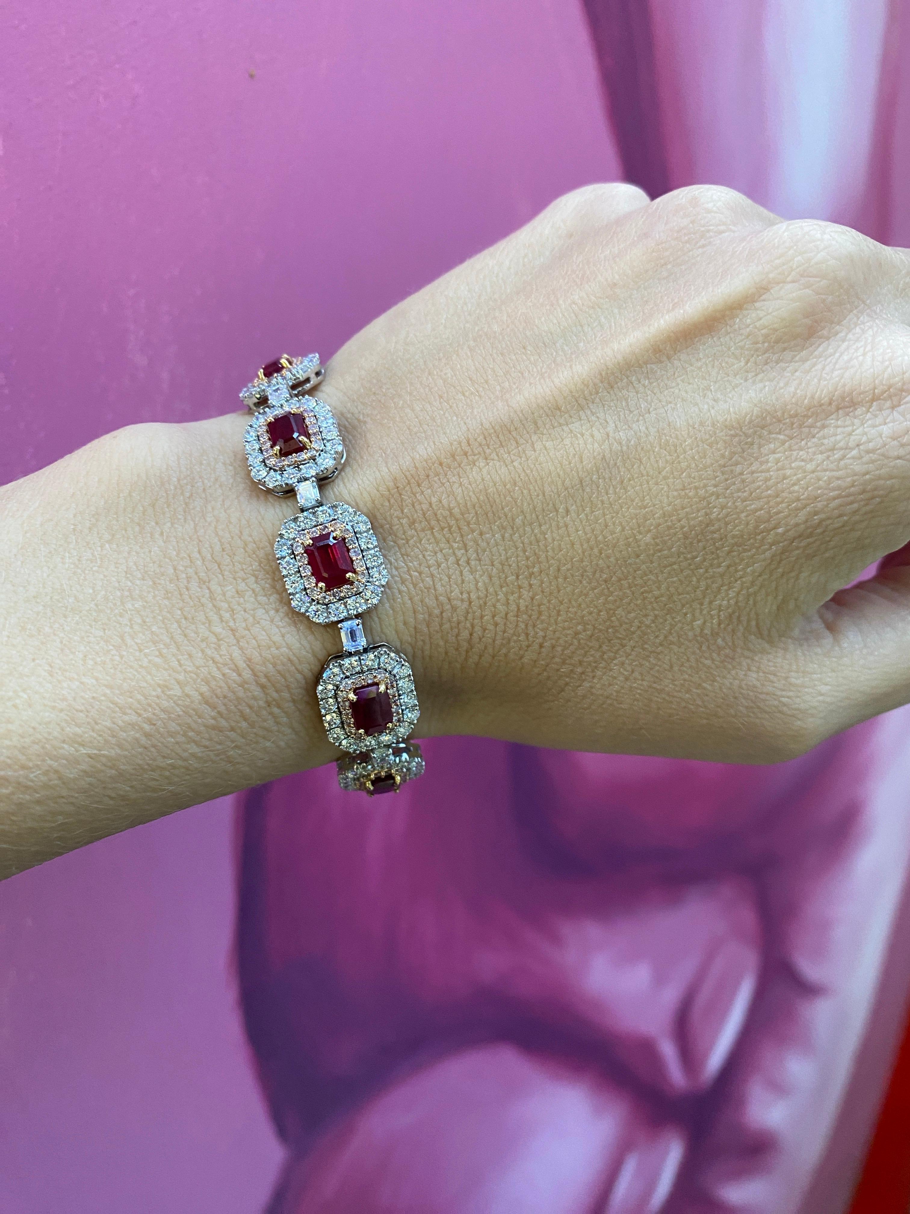 11.69ctw Emerald Cut Rubies and Diamond Link Bracelet, 18 Karat Gold For Sale 1