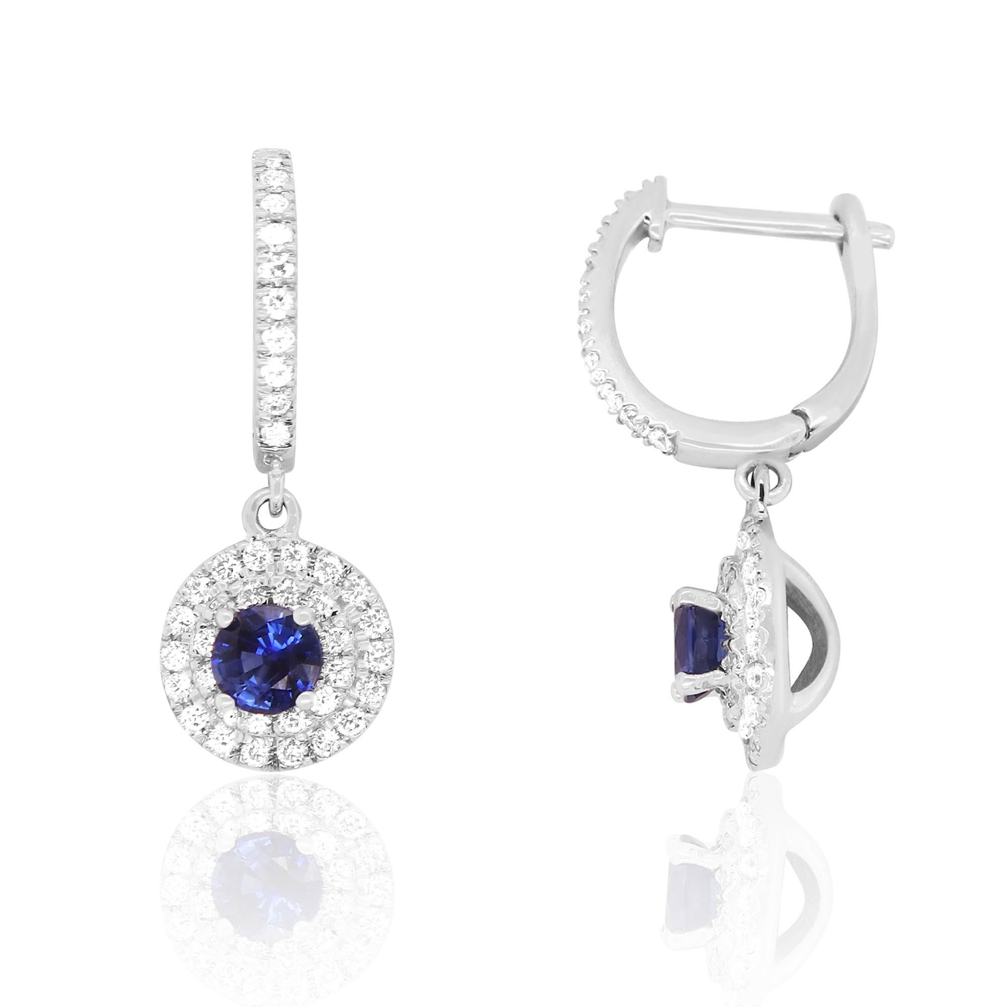 Material: 14k White Gold 
Stone Details: 2 Round Blue Sapphires at 1.16 Carats Total
80 Brilliant Round White Diamonds at 0.83 Carats- Clarity: SI / Color: H-I

Fine one-of-a-kind craftsmanship meets incredible quality in this breathtaking piece of