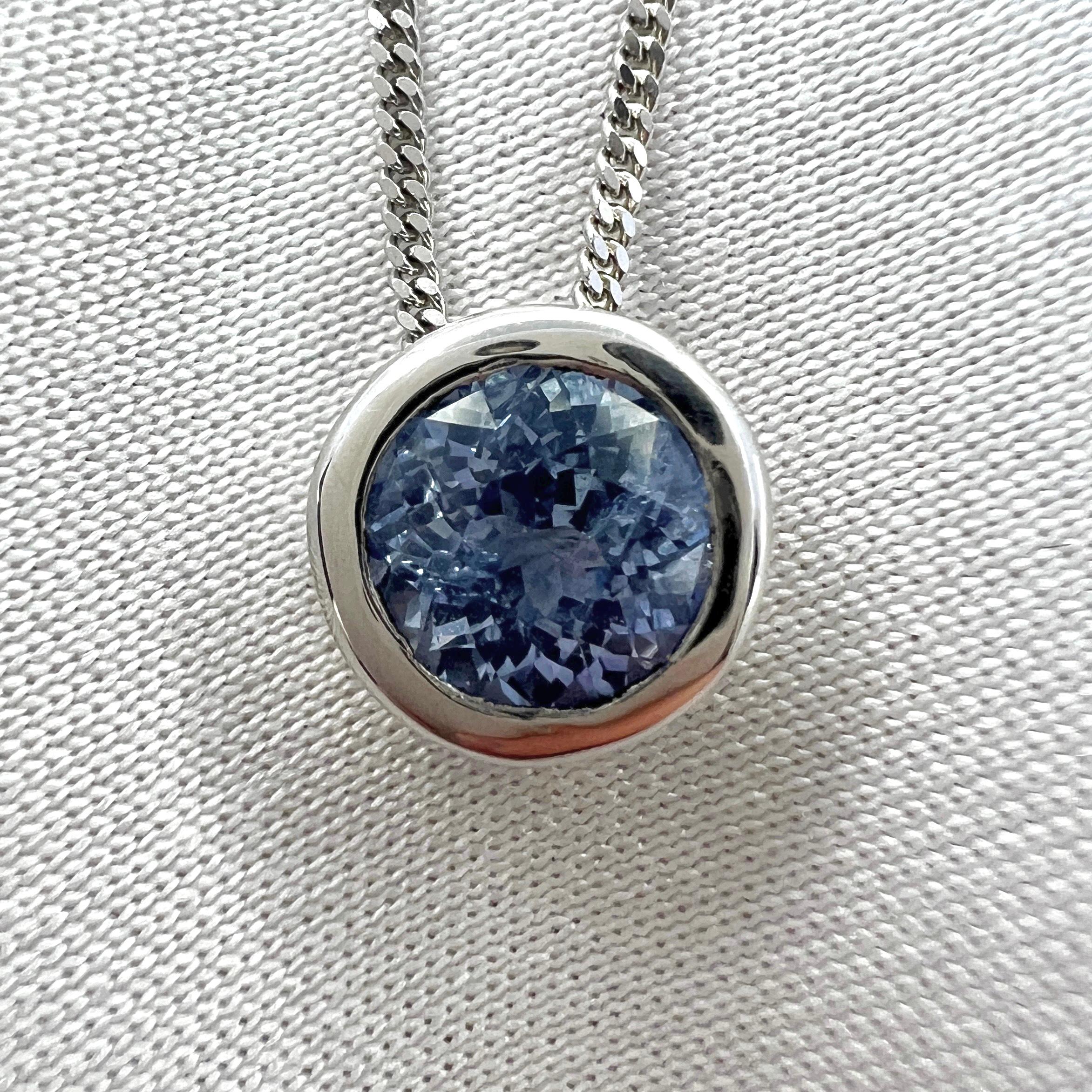 Light Blue Ceylon Sapphire 18k White Gold Round Cut Bezel Rubover Pendant Necklace.

1.16 Carat sapphire with a beautiful vivid light blue colour and very good clarity, a clean stone with only some small natural inclusions visible when looking