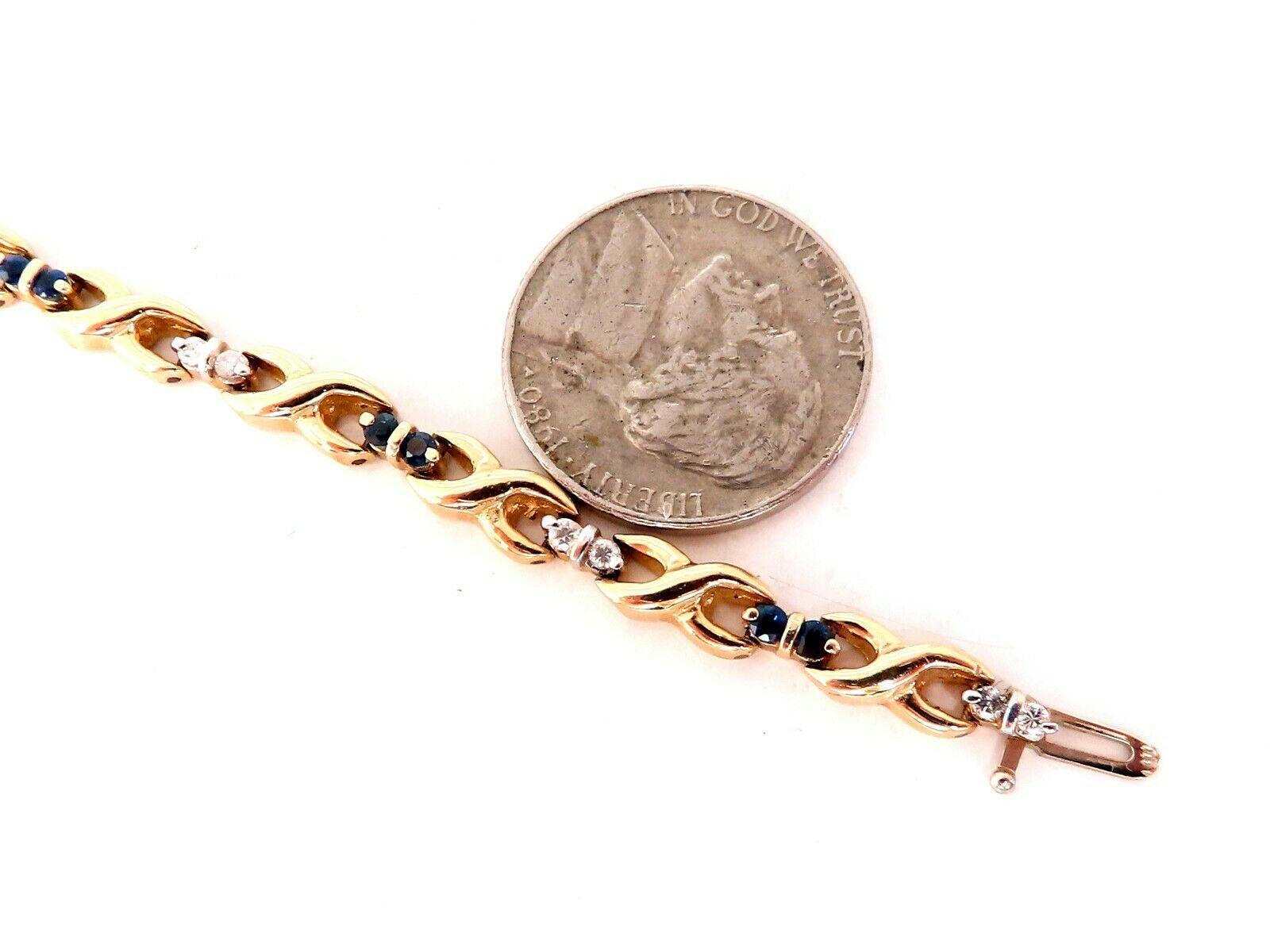 .80ct Natural Round Blue Sapphire Bracelet.

2mm average each.

Diamonds: .36ct. 

H color, Vs-2 clarity.

14kt. yellow gold

Bracelet measures 7 inches.

4.6mm wide

Free Insured shipping.

12.1 Grams