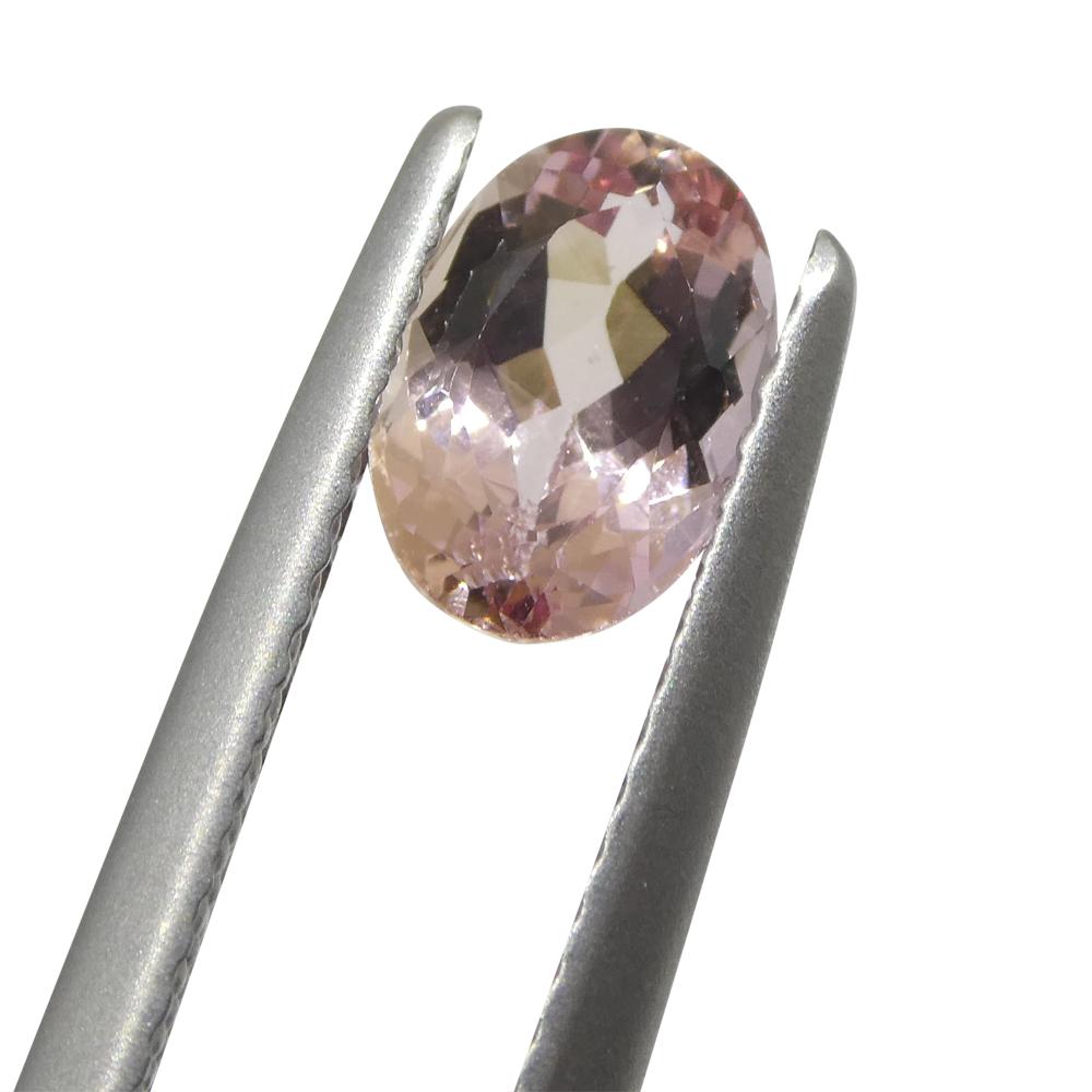 Brilliant Cut 1.16ct Oval Orangy Pink Topaz GIA Certified For Sale