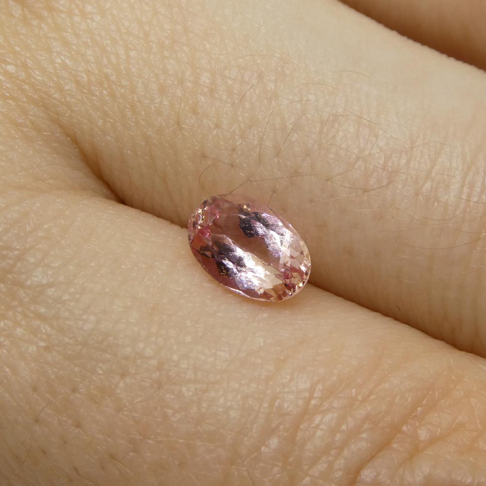 1.16ct Oval Orangy Pink Topaz GIA Certified For Sale 1