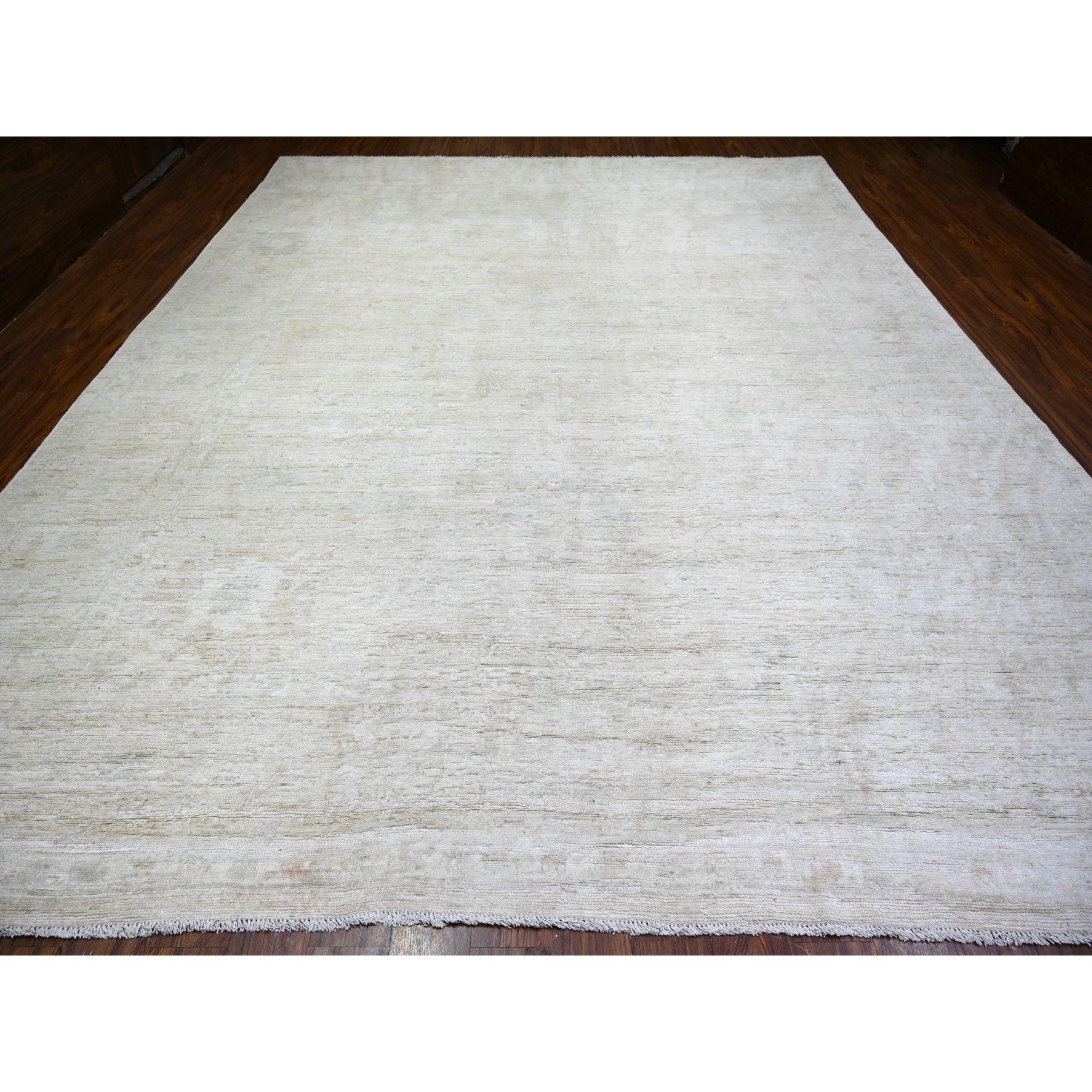 Ivory, Afghan Angora Oushak with Faded Colors, Natural Dyes, Extra Soft Wool, Hand Knotted, Oversized Oriental Rug
Primary materials: Wool
Latex: No
Pile height: 0.25 Inches
Style: Transitional
Primary color: Ivory
Secondary colors: Ivory,