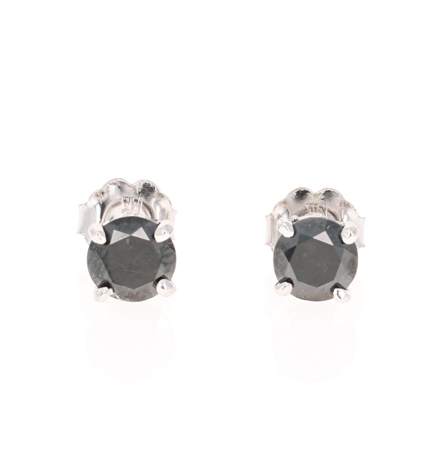 Black Cuties! 

These simple and versatile earrings have 2 Black Round Cut Diamonds that weigh 1.17 Carats. 

Curated in 14 Karat White Gold and measure at approximately 5 mm. 

