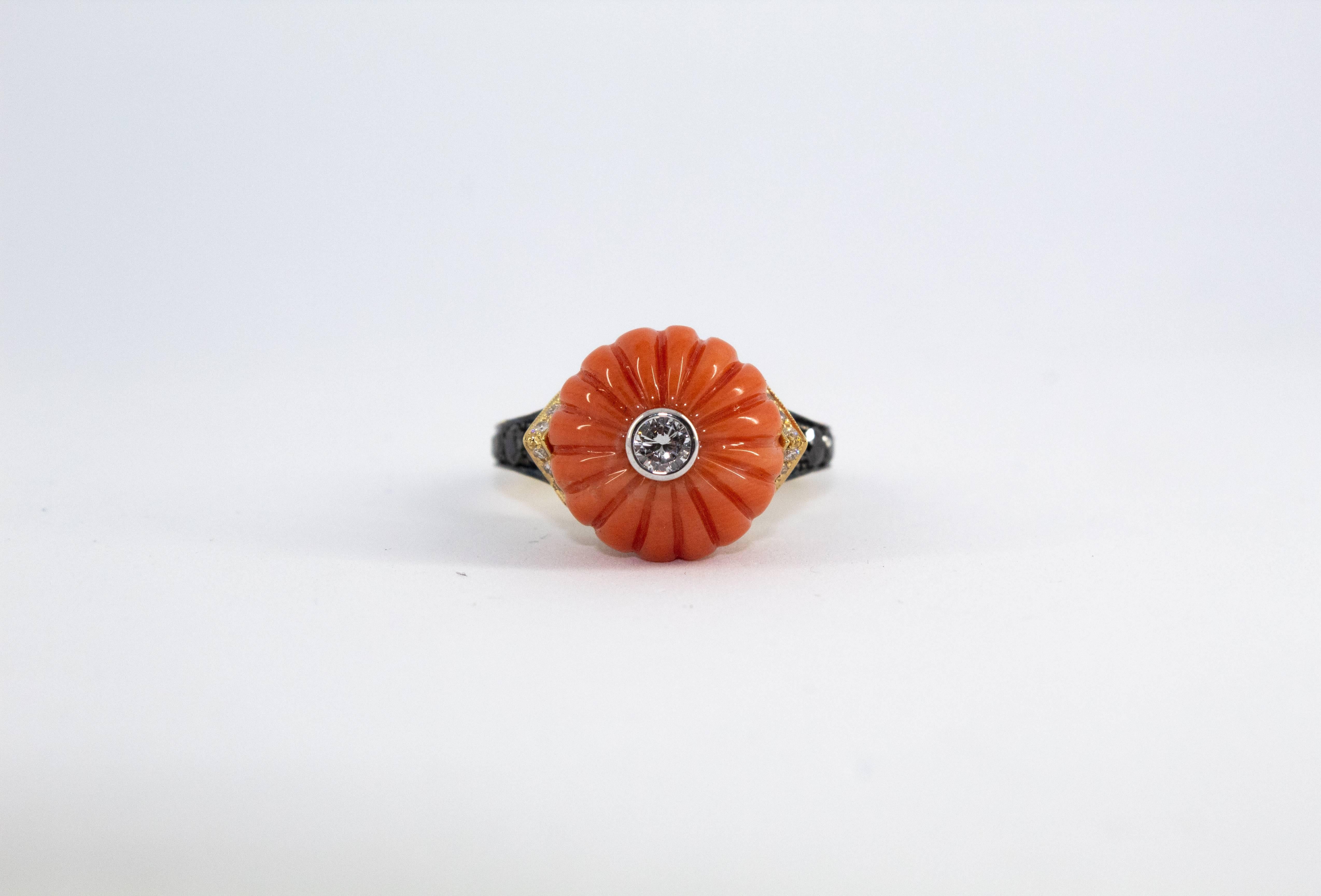 This Ring is made of 18K Yellow Gold.
This Ring has 0.81 Carats of White Diamonds.
This Ring has 1.17 Carats of Black Diamonds.
This Ring has also a Coral.
This Ring is inspired by Renaissance Style.
Size ITA: 17 USA: 8
We're a workshop so every