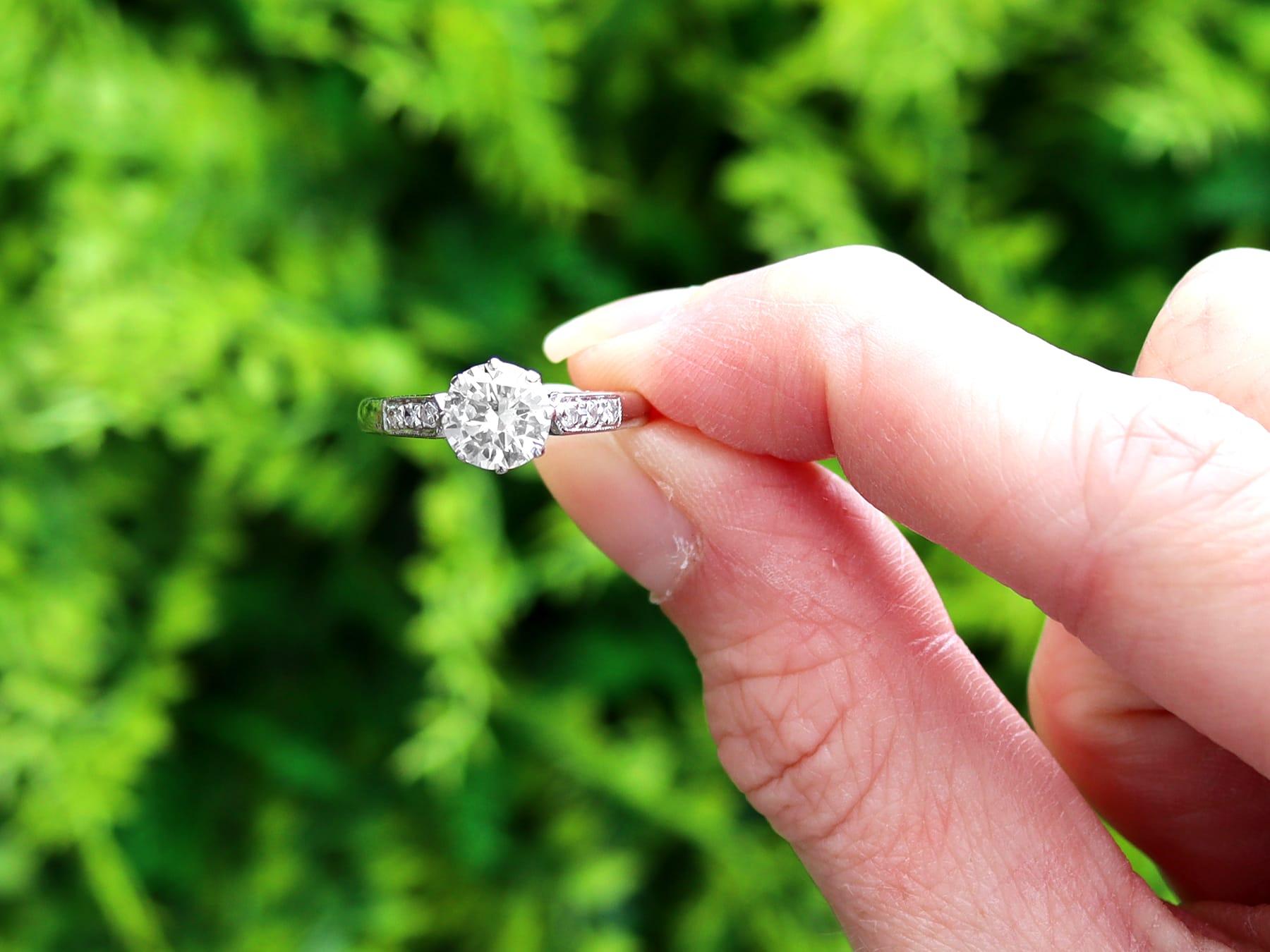 A stunning, fine and impressive 1.17 carat diamond and 18k  white gold solitaire style engagement ring; part of our round cut engagement rings collections.

This stunning, fine and impressive antique engagement ring has been crafted in 18k white