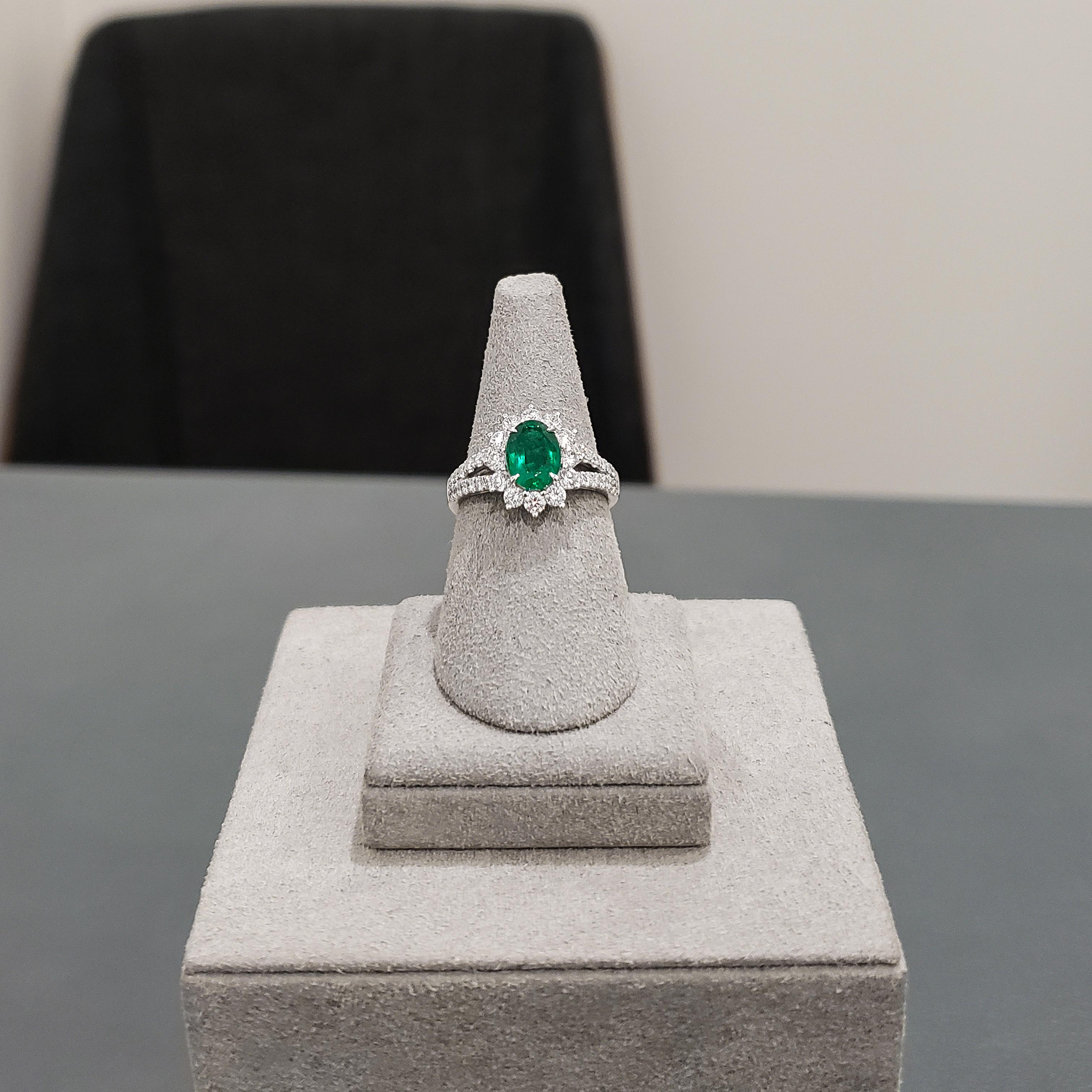 Modern Roman Malakov 1.17 Carat Oval Cut Green Emerald and Diamond Halo Engagement Ring For Sale