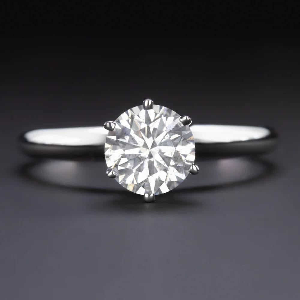 Absolutely timeless solitaire ring featuring a brilliant and vibrant 1.17 Carat natural diamond, set in an elegant and sophisticated 14K white gold setting.
The center diamond is vivid, clean to the eye, and brilliant white. The classic solitaire