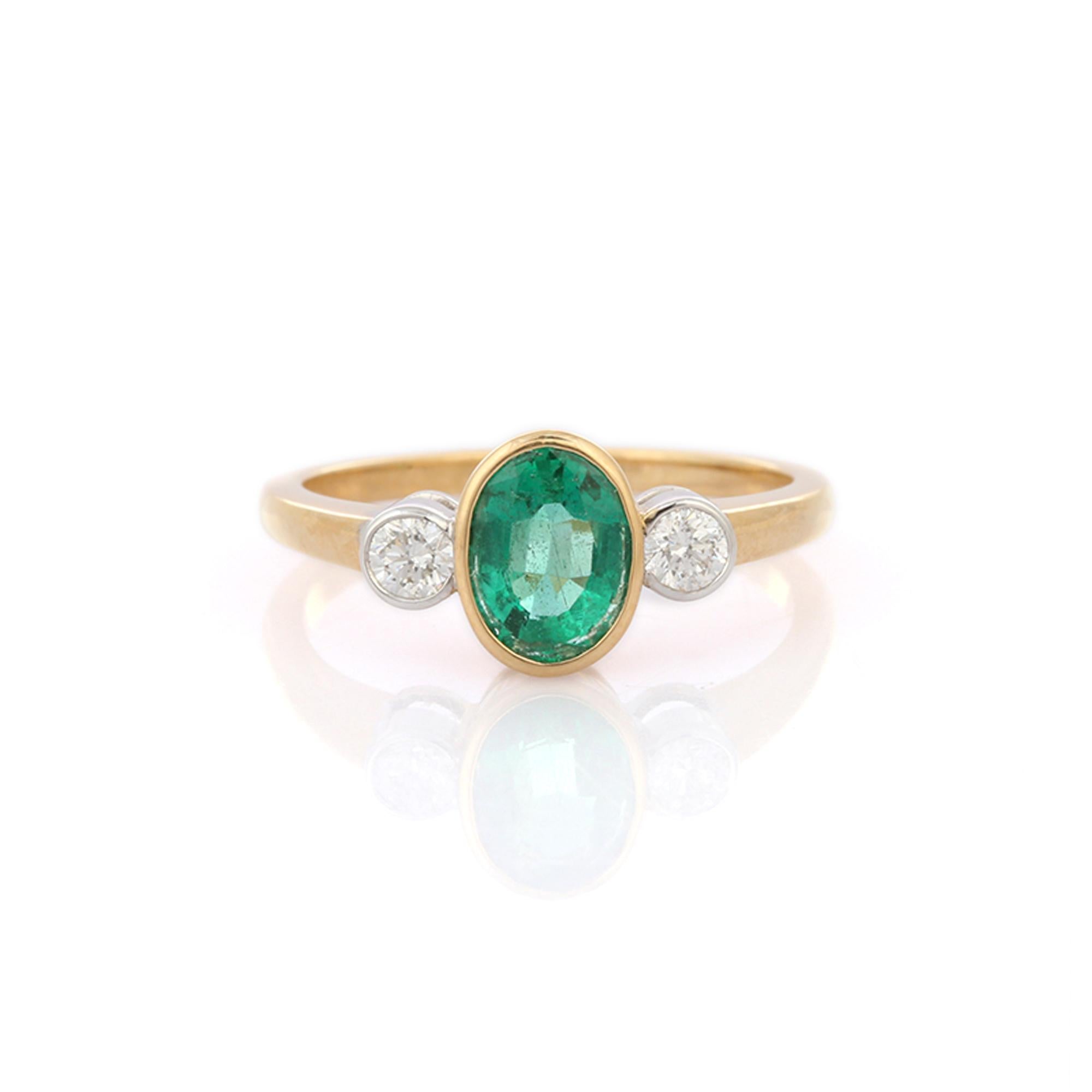 For Sale:  1.17 Ct Bezel Set Oval Emerald and Diamond in 18K Yellow Gold Three Stone Ring 5
