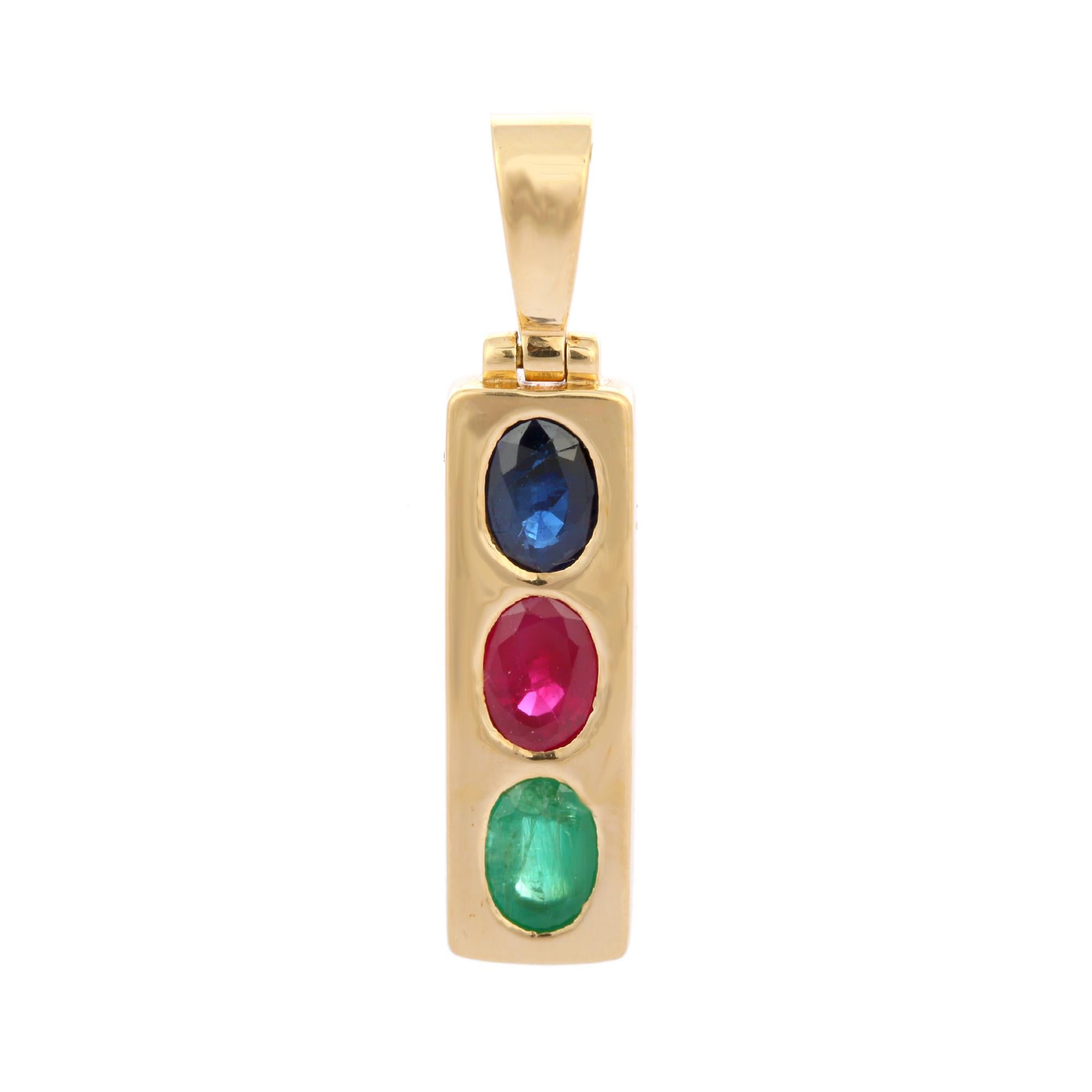 Multi color emerald, ruby and sapphire pendant in 18K Gold. It has a oval cut gemstone that completes your look with a decent touch. Pendants are used to wear or gifted to represent love and promises. It's an attractive jewelry piece that goes with