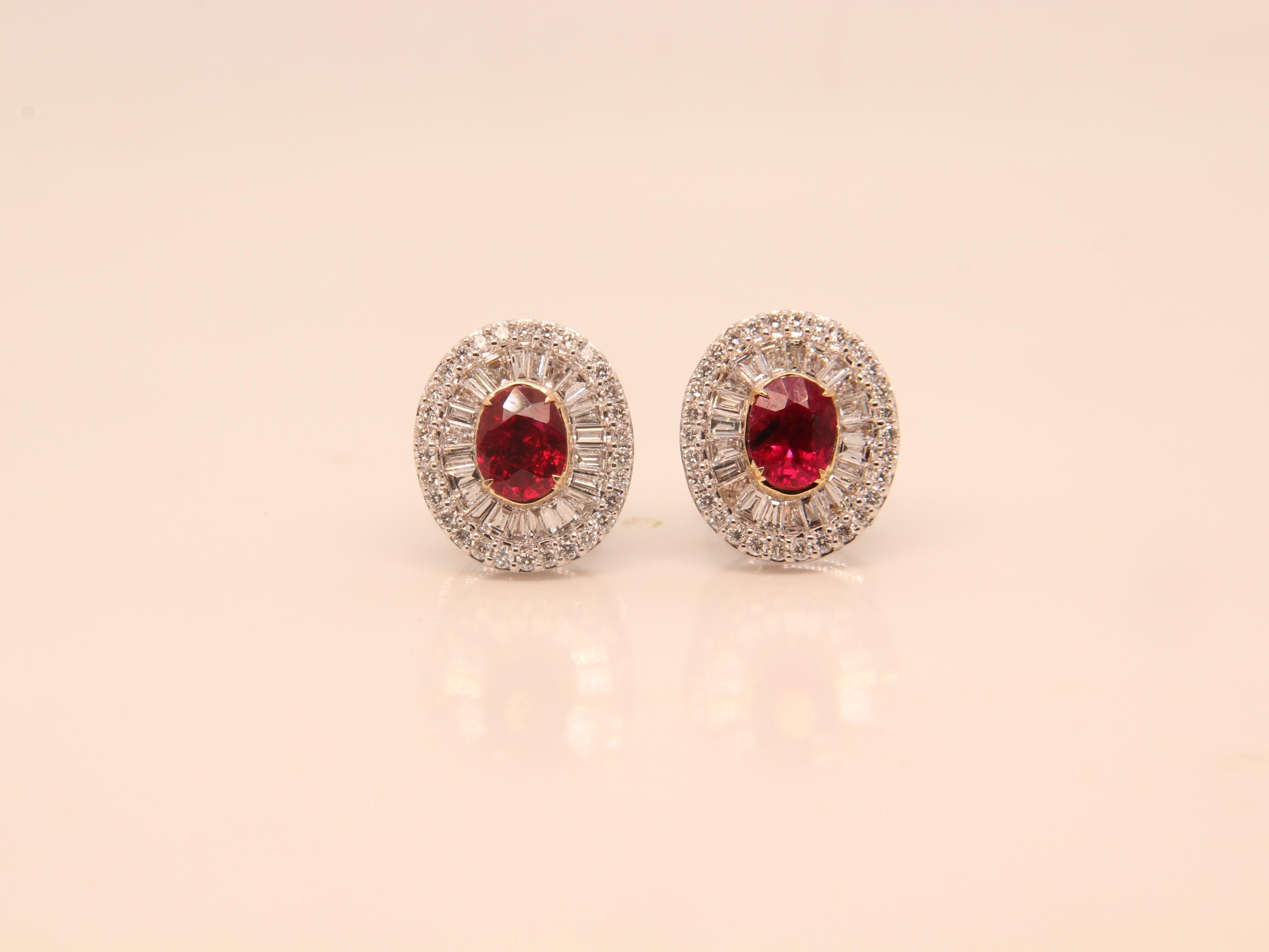 A brand new ruby and diamond earring by Rewa. The Burmese 'Pigeon Blood' ruby weigh 0.58 and 0.59 carat each and they are both certified by Gem Research Swisslab (GRS). The rubies are surrounded by 0.81 carat diamonds studded on 18k white gold 5.00