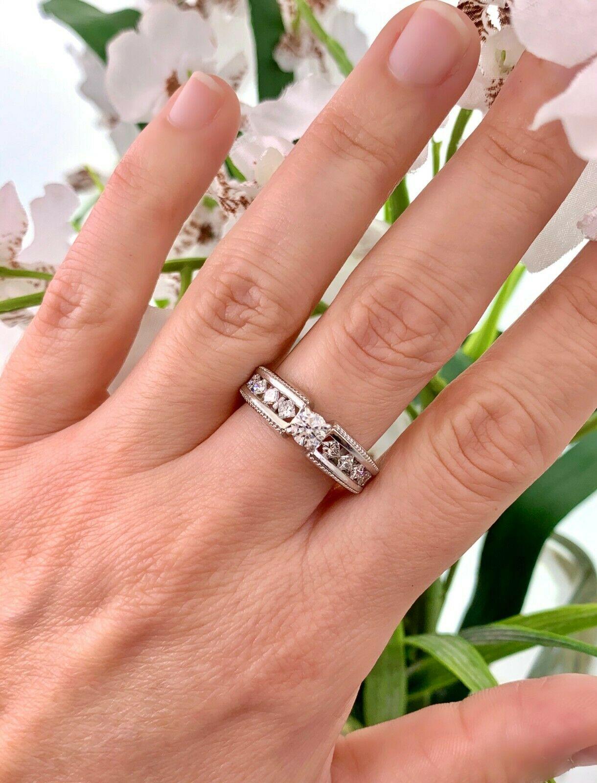 1.17 carat diamond ring on finger