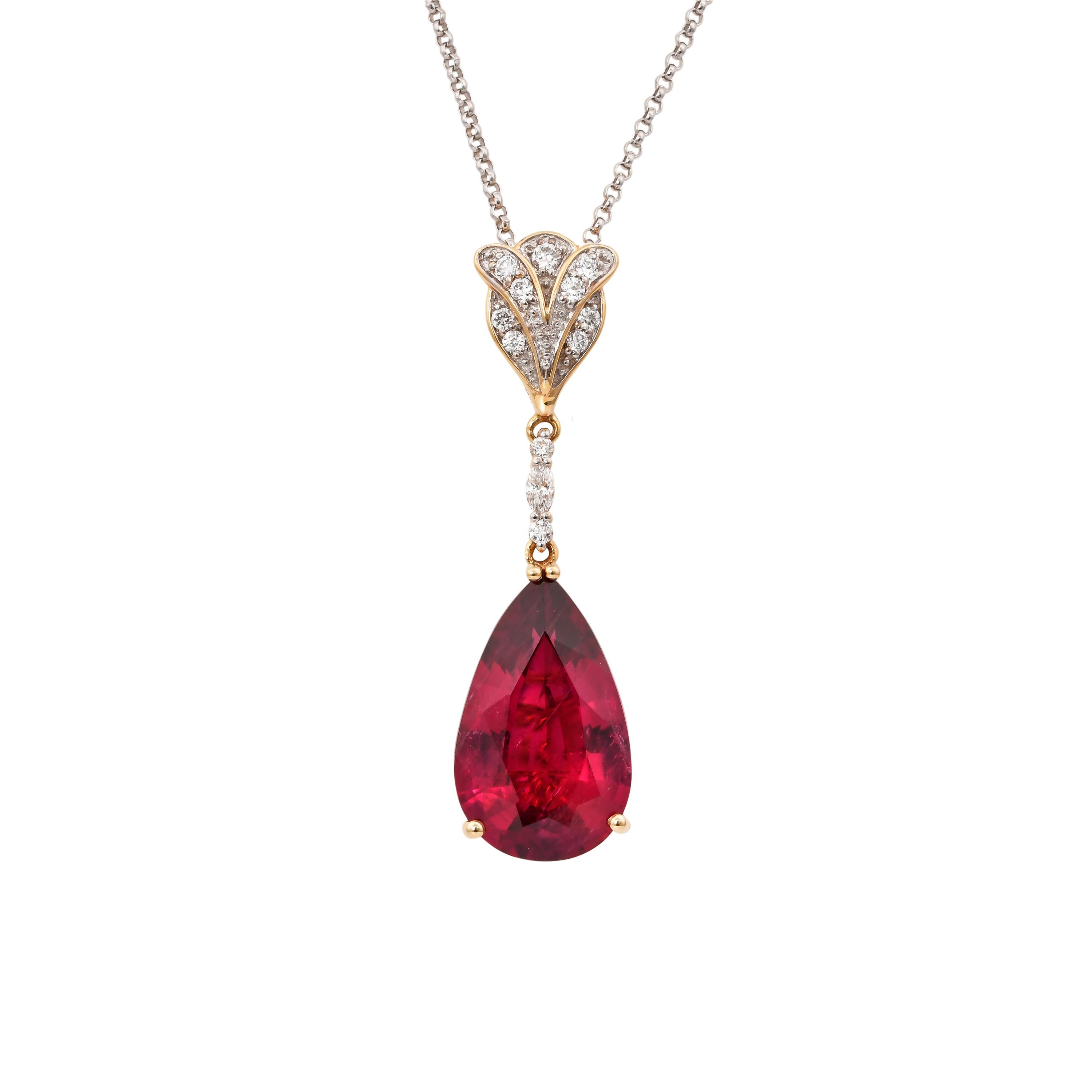 This collection features the most radiant Rubellite tourmalines. These gemstones show a magnificent and regal deep red Colour, and the yellow gold and diamond accents makes these pieces a true showstopper. 

Classic Rubellite tourmaline pendant in