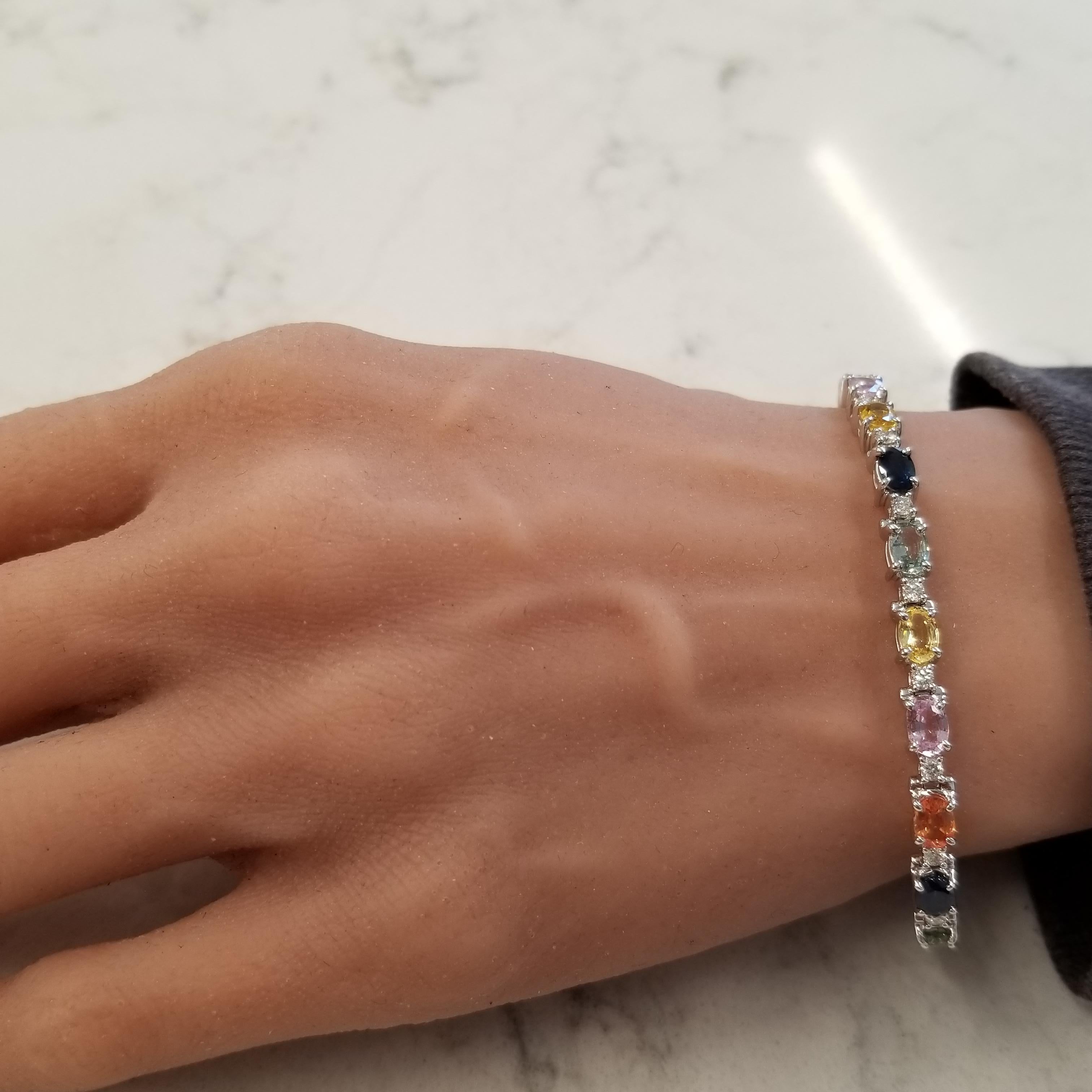 The colors in this natural sapphire bracelet make it one to be remembered. A total of 20 oval cut, prong set, sapphires that measure 6x4MM each and weigh a total of 11.72 carats adorn this stunning bracelet. The sapphires are sourced from Sri Lanka;