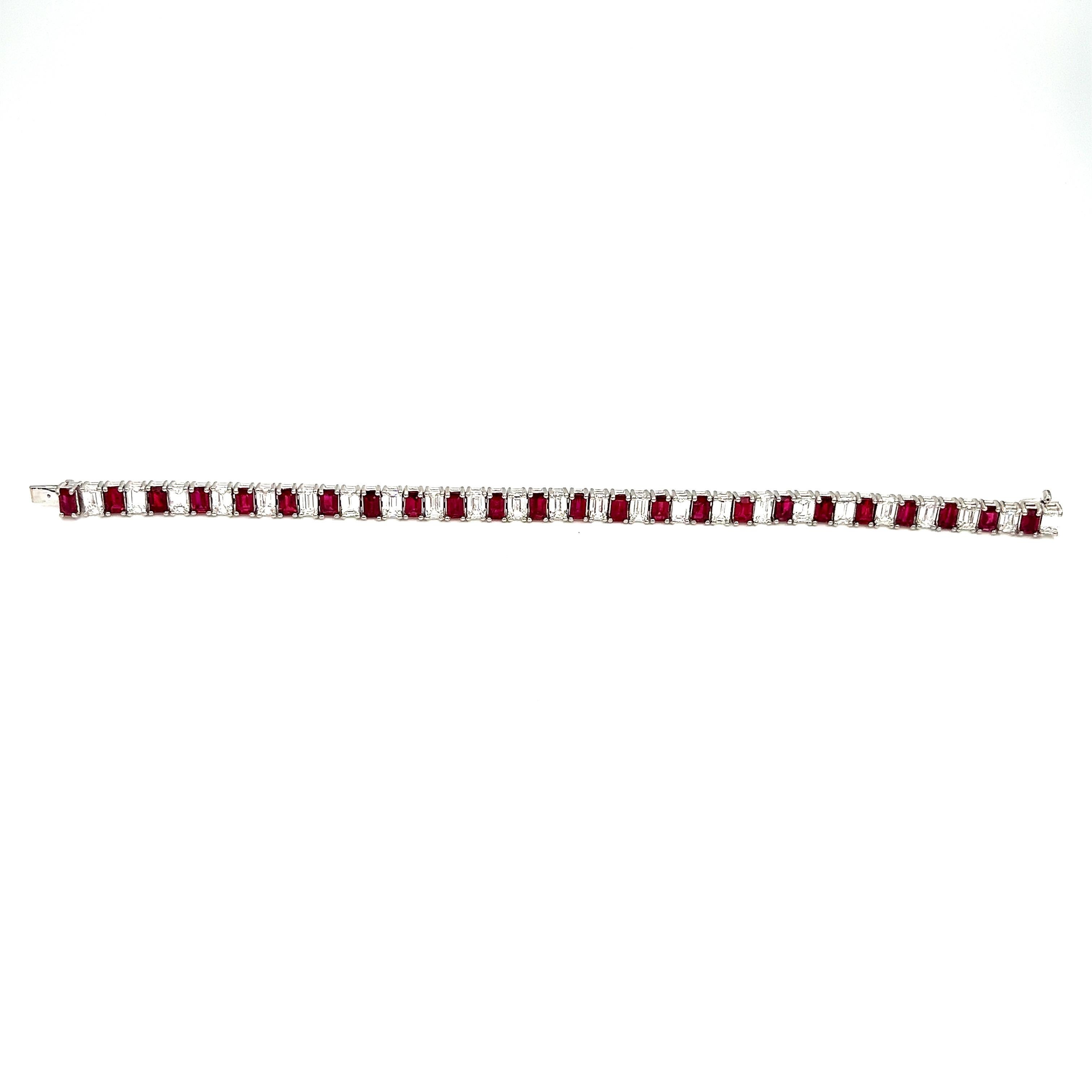 This bracelet features 24 emerald-cut natural rubies weighing 9.29 ct and 24 baguette shape diamonds weighing 8.00 ct set in platinum. A must have for any fashionista!!