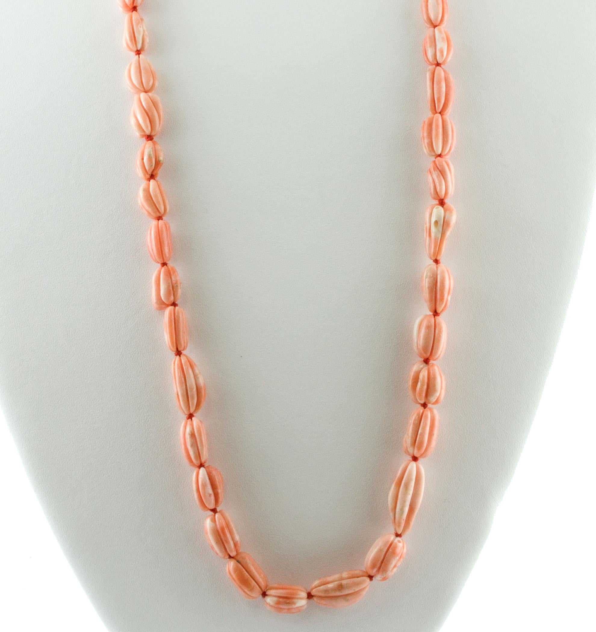 SHIPPING POLICY:
No additional costs will be added to this order.
Shipping costs will be totally covered by the seller (customs duties included).

Wonderful long coral necklace, realized with 117.3 g of pink coral secundum finely carved by Italian
