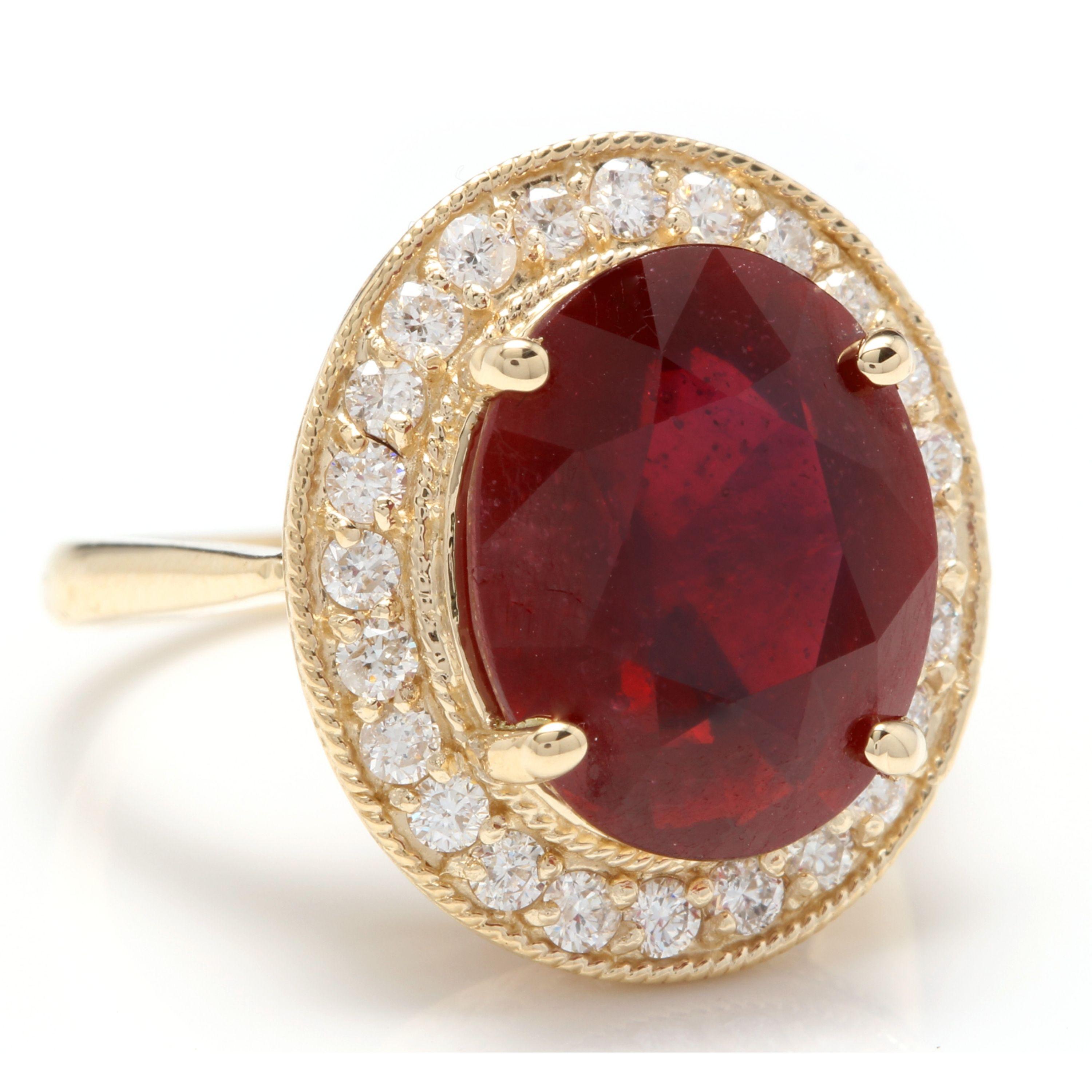 11.75 Carats Impressive Natural Red Ruby and Diamond 14K Yellow Gold Ring

Total Red Ruby Weight is Approx. 11.00 Carats (Lead Glass Filled)

Ruby Measures: Approx. 14.00 x 11.00mm

Natural Round Diamonds Weight: Approx. 0.75 Carats (color G-H /