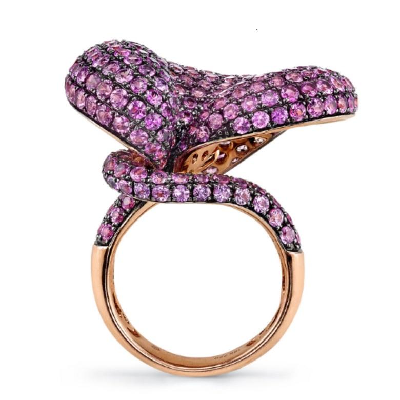 Celebrate the beauty of nature and the resilience of the human spirit with this stunning pink sapphire and diamond ring, inspired by the delicate beauty of Calla Lilies. With 11.75ct of pink sapphires, this ring is a stunning display of the wisdom