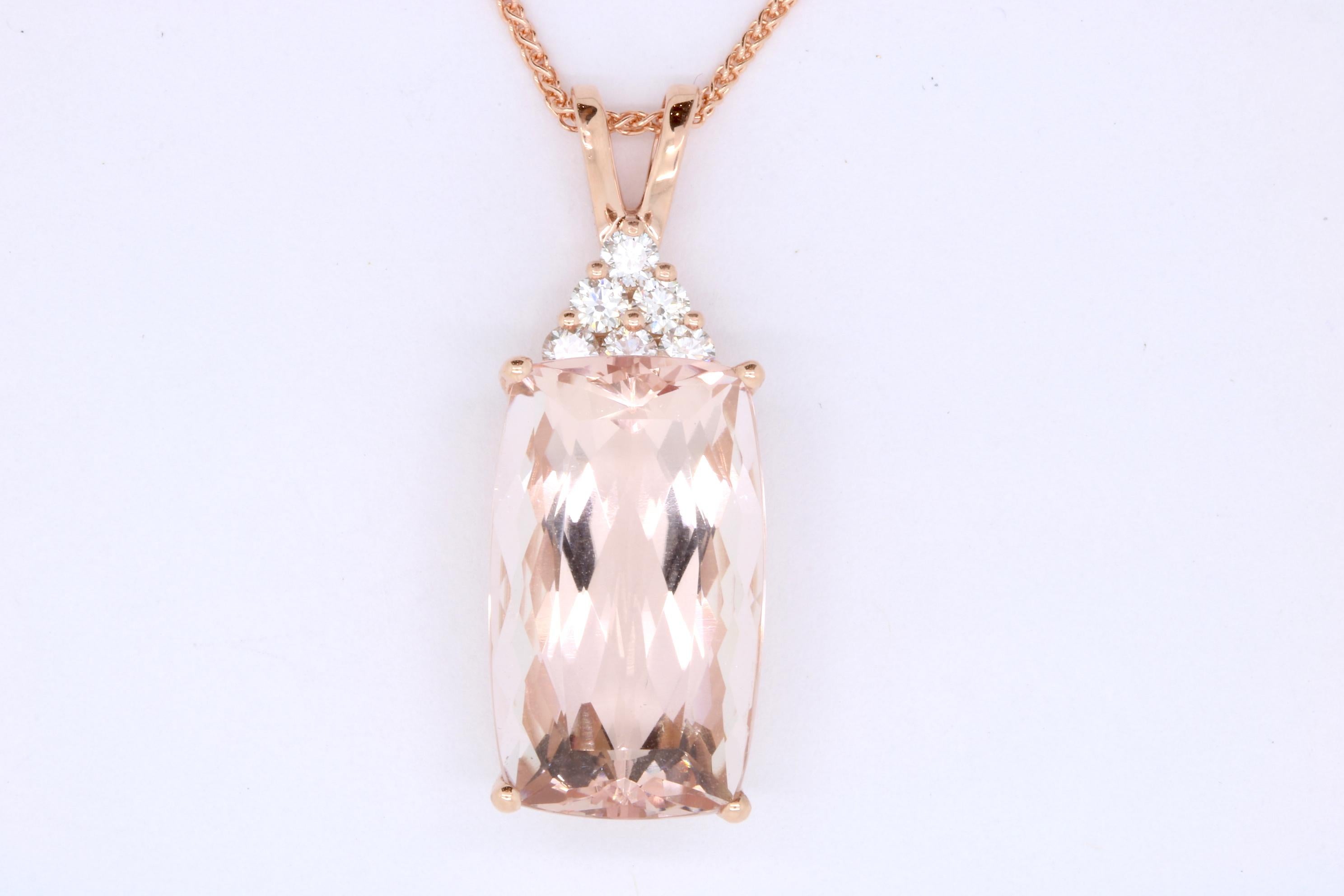 Material: 14k Rose Gold 
Center Stone Detail:  1 Cushion Cut Pink Morganite at 11.77 Carats
Stone Details:  6 Round White Diamonds at 0.31 Carats - Clarity: SI / Color: H-I
Length:  18 Inches

Fine one-of-a-kind craftsmanship meets incredible