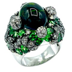 Bague cocktail en or 18 carats avec tourmaline verte de 11,78 carats, diamant et grenat tsavorite