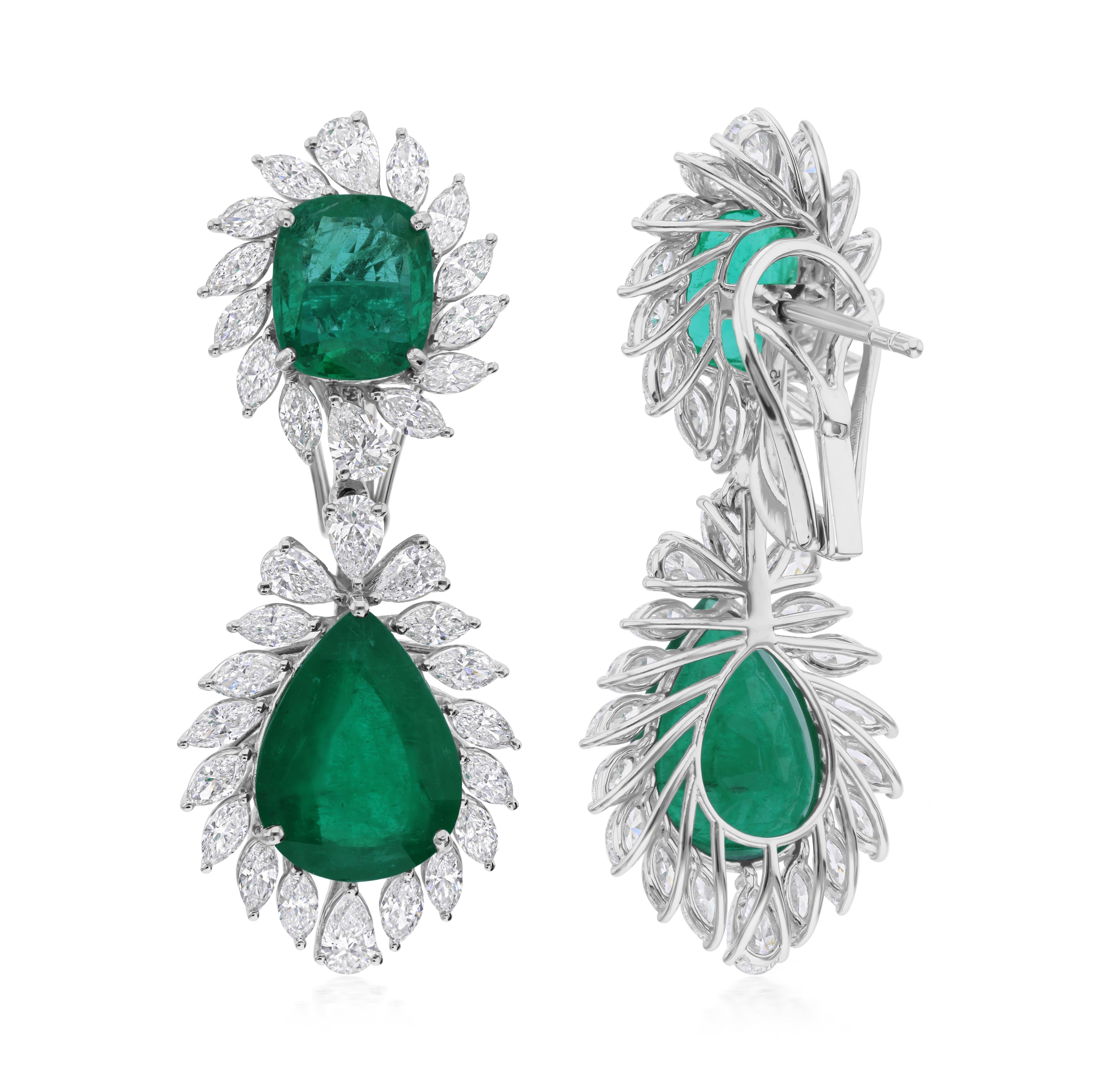 Diese exquisiten Ohrringe aus 18-karätigem Gold sind mit einem sambischen Smaragd von 11,78 Karat und 4,10 Karat funkelnden Diamanten besetzt.

FOLLOW SPECTRUM JEWELS Storefront, um die neueste Collection'S und exklusive Stücke zu sehen. Spectrum
