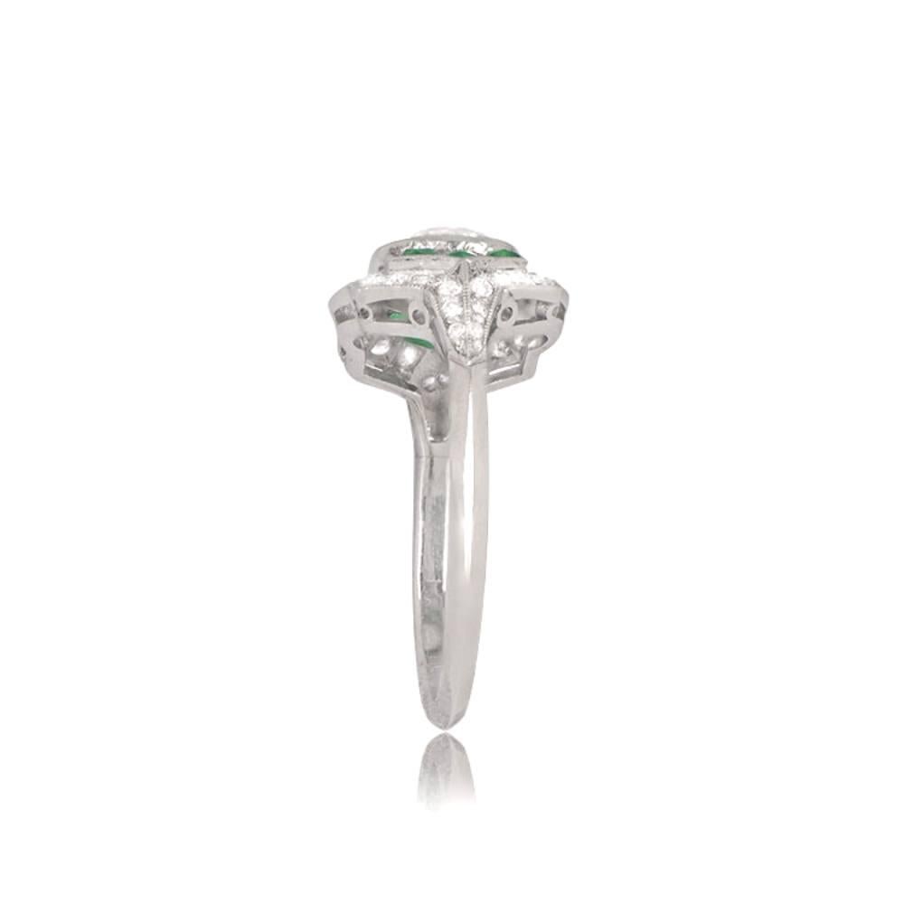 This exquisite Art Deco engagement ring features a vibrant old European cut diamond as the center stone, flanked by calibre bullet-shaped natural emeralds. The center design is accentuated by a halo of old European cut diamonds, meticulously