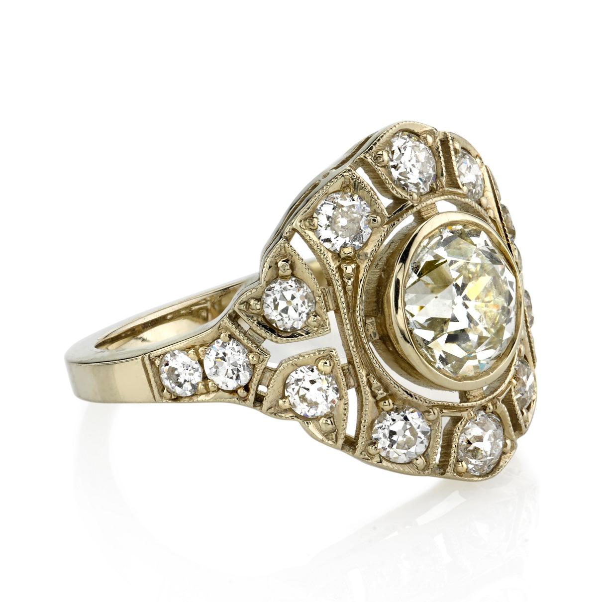 1.17ct K/VS1 EGL certified old Mine cut diamond with 0.82ctw diamond accents set in a handcrafted 18k champagne gold mounting. Ring is currently a size 6 and can be sized to fit. 
