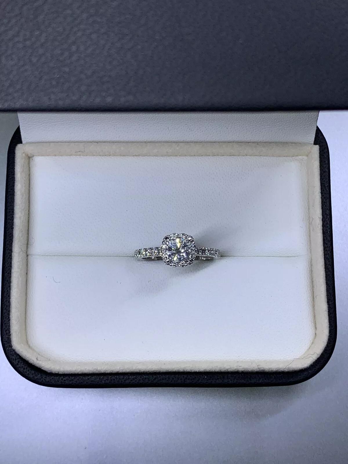 1.17ct Round diamond halo engagement ring in 18k white gold.

Round diamond solitaire GIA certified total weight 0.42ct too D colour VS1 clarity great diamond characteristics.

Solitaire engagement ring with GIA certified diamonds.

Diamond halo