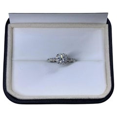 1.17ct Round diamond halo engagement ring in 18k white gold.