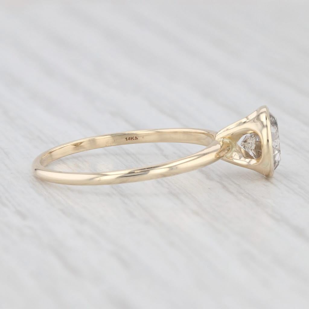 Información sobre la gema:
- Diamante natural -
Quilates - 1,17ct 
Talla - Redonda brillante
Color - I (Sal y Pimienta)
Claridad - I3

Metal: Oro amarillo de 14 quilates
Peso: 1,7 gramos 
Sellos: 14k
Altura de la cara: 7.4 mm 
Altura sobre el dedo: