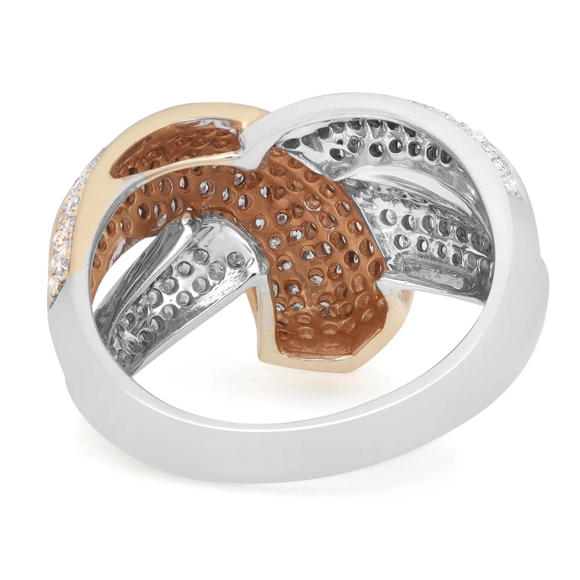 Presenting a luxury and bold two tone crisscross design natural diamond ring crafted in 14k white and yellow gold. This fancy ring is highlighted with 1.17 carats of dazzling white round cut diamonds with I color and SI1 clarity. The ring size is