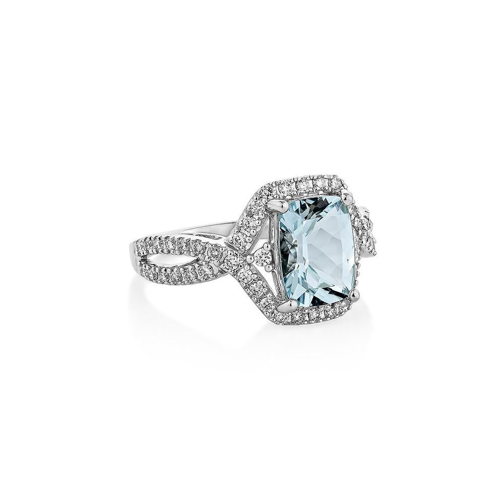 Contemporary 1.18 Carat Aquamarine Fancy Ring in 18Karat White Gold with White Diamond.    For Sale