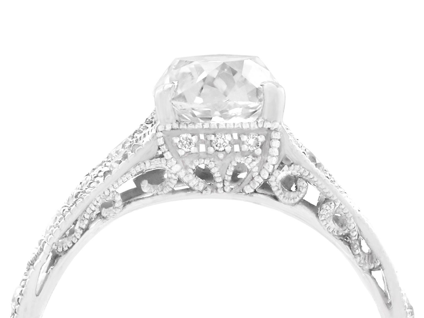 A fine and impressive antique 1.34 carat diamond (total) solitaire displayed in a contemporary platinum setting; part of our diamond jewelry collections.

This fine diamond engagement ring ring has been crafted in platinum.

The solitaire ring