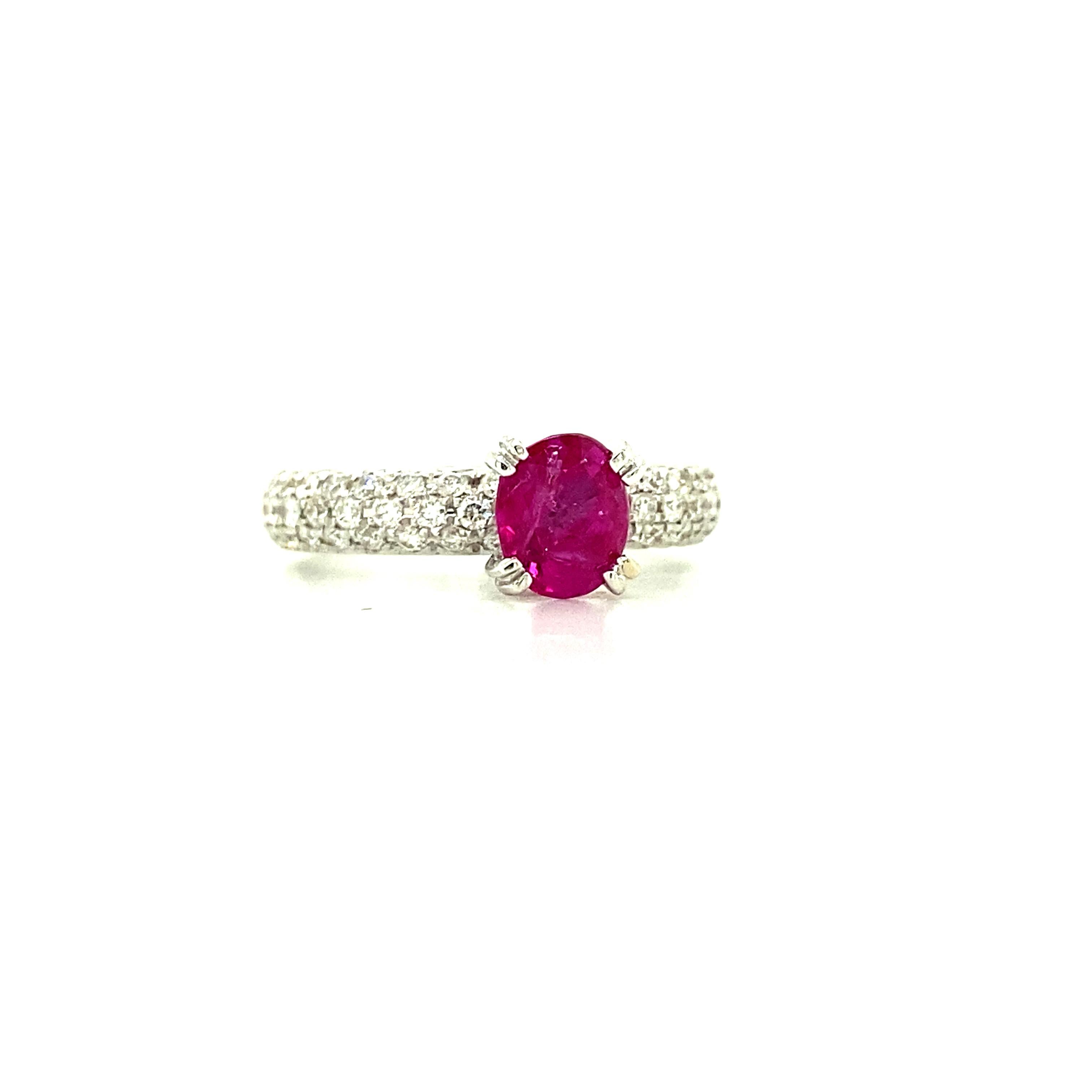 1.18 Carat GRS Certified Unheated Burmese Pink Sapphire and White Diamond Ring:

A spectacular ring, it features a beautiful GRS certified oval-cut unheated Burmese vivid pink sapphire weighing 1.18 carat, with white round brilliant diamonds