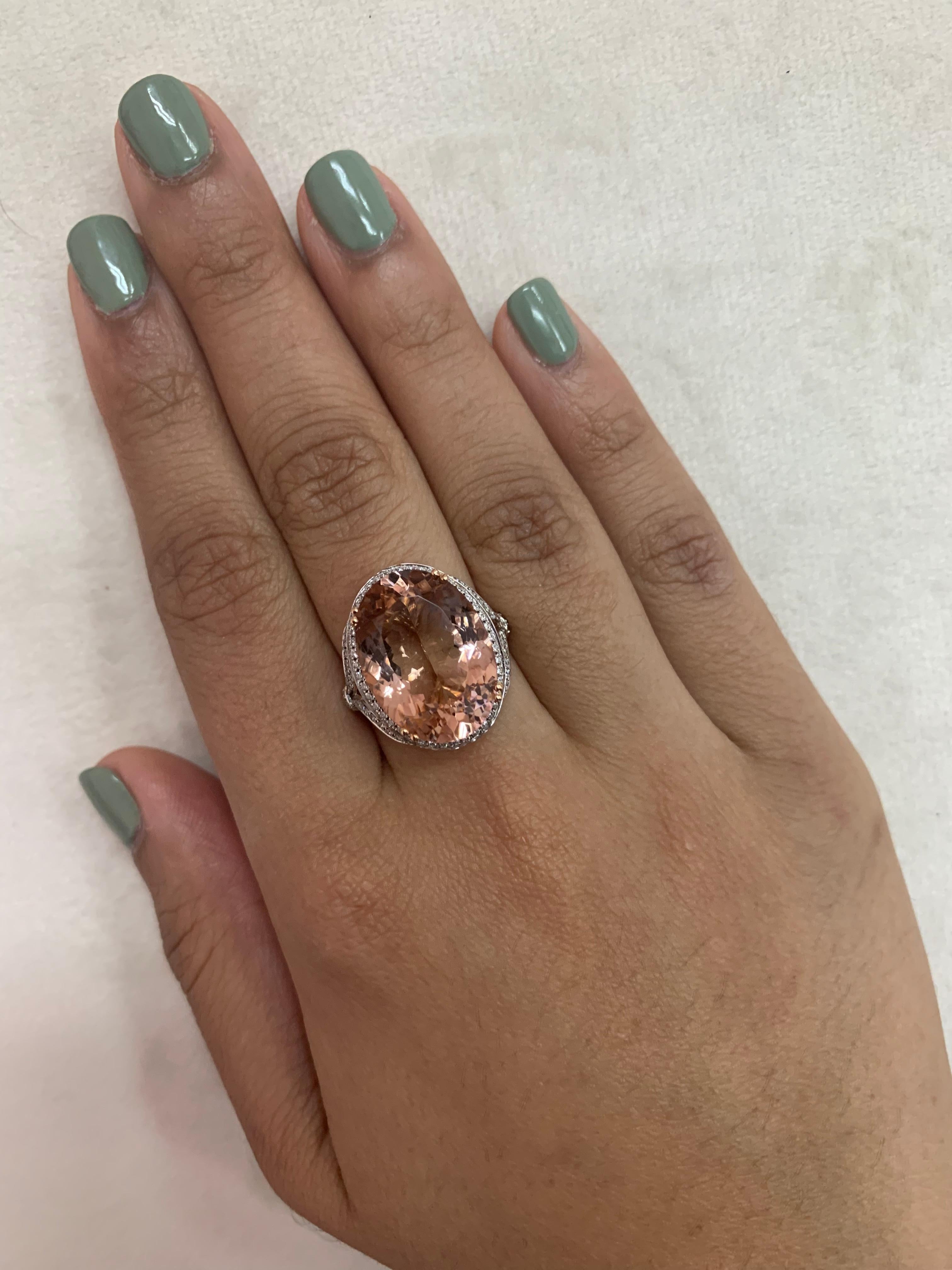 This collection features an array of magnificent morganites! Accented with diamonds these rings are made in rose gold and present a classic yet elegant look. 

Classic morganite ring in 18K rose gold with diamonds. 

Morganite: 11.84 carat oval