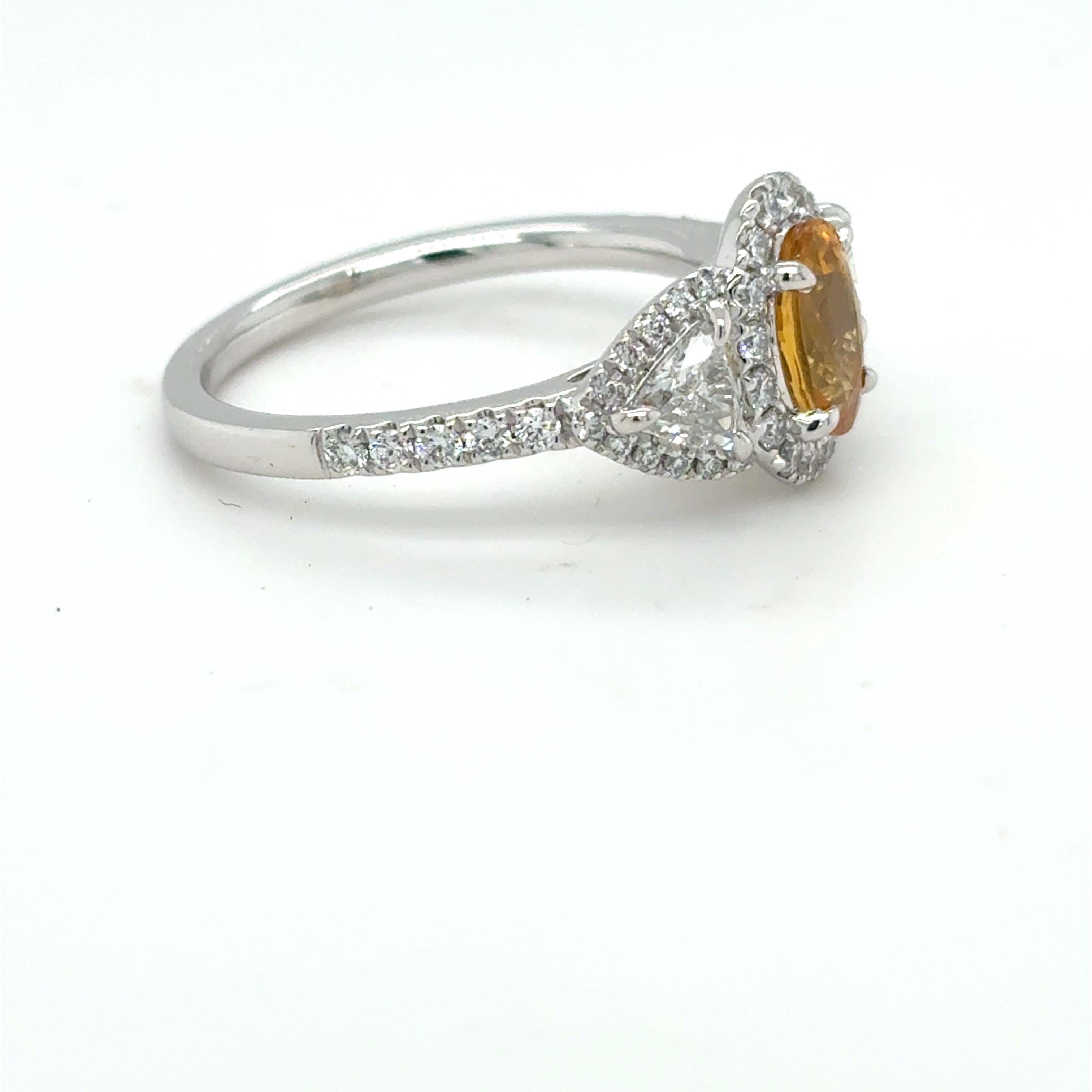 Women's 1.18 Carat Oval Cut Yellow Sapphire Diamond Platinum Ring For Sale