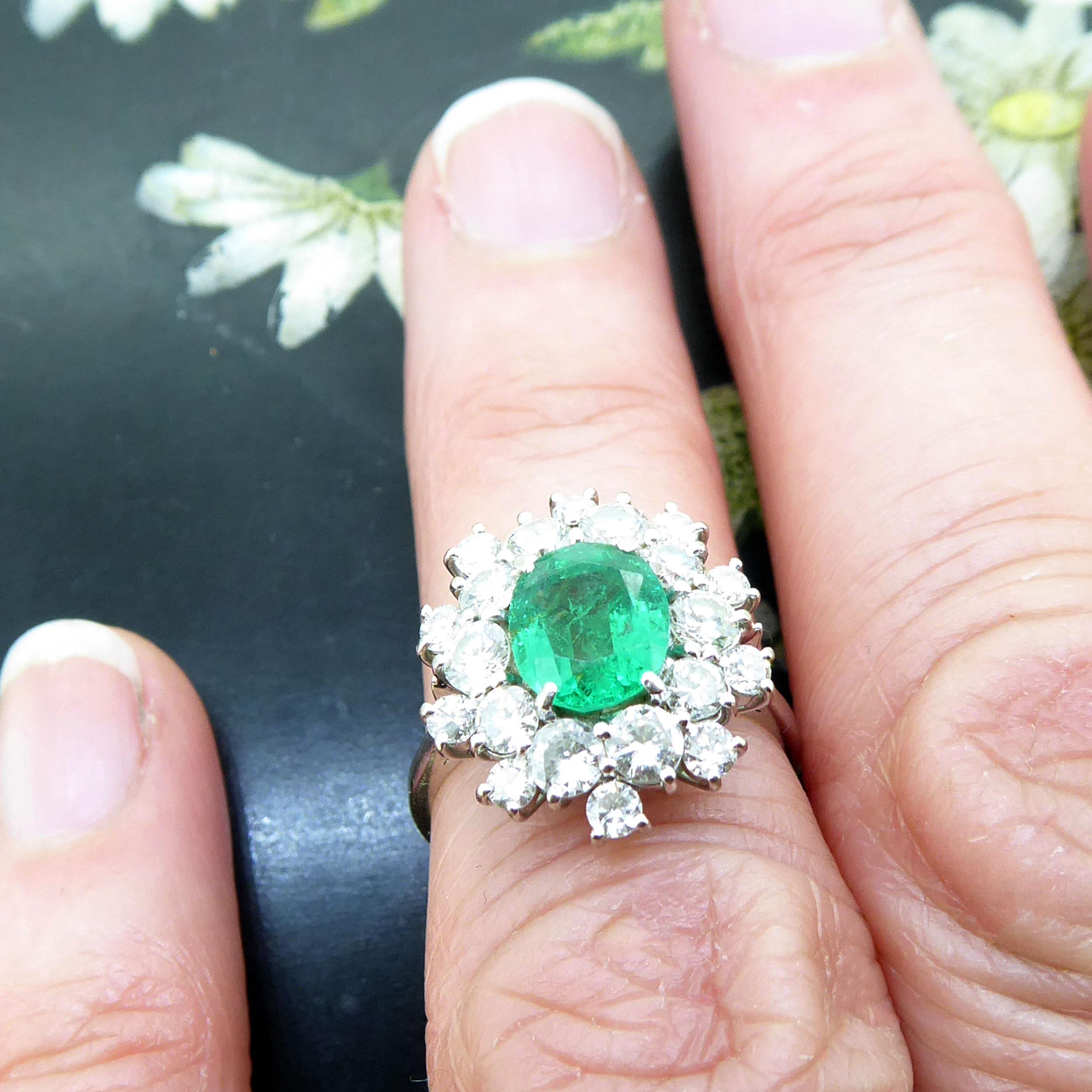 Retro 1.18 Carat Oval Emerald and Diamond Cluster Style Ring, 18ct Gold