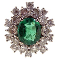 Vintage 1.18 Carat Oval Emerald and Diamond Cluster Style Ring, 18ct Gold