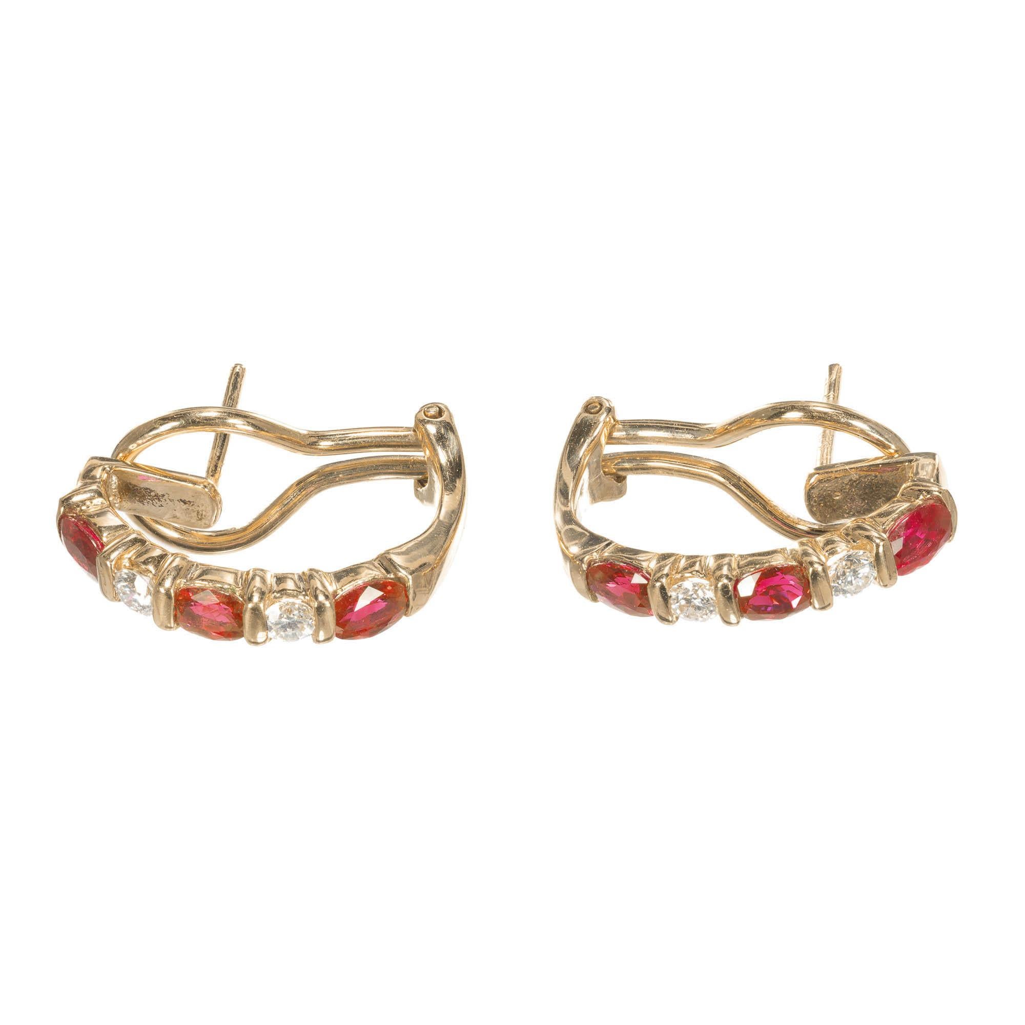 18k yellow gold Ruby and Diamond earrings. Oval shaped Rubies alternating with round brilliant cut Diamonds in 18k yellow gold channel set design setting.

6 oval red Rubies, approx. total weight .90cts, 3.2 x 3.1 x 1.9mm, GIA certificate