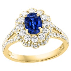 Cocktail-Blumenring mit 1,18 Karat ovalem Saphir und Diamant aus 18 Karat Gelbgold