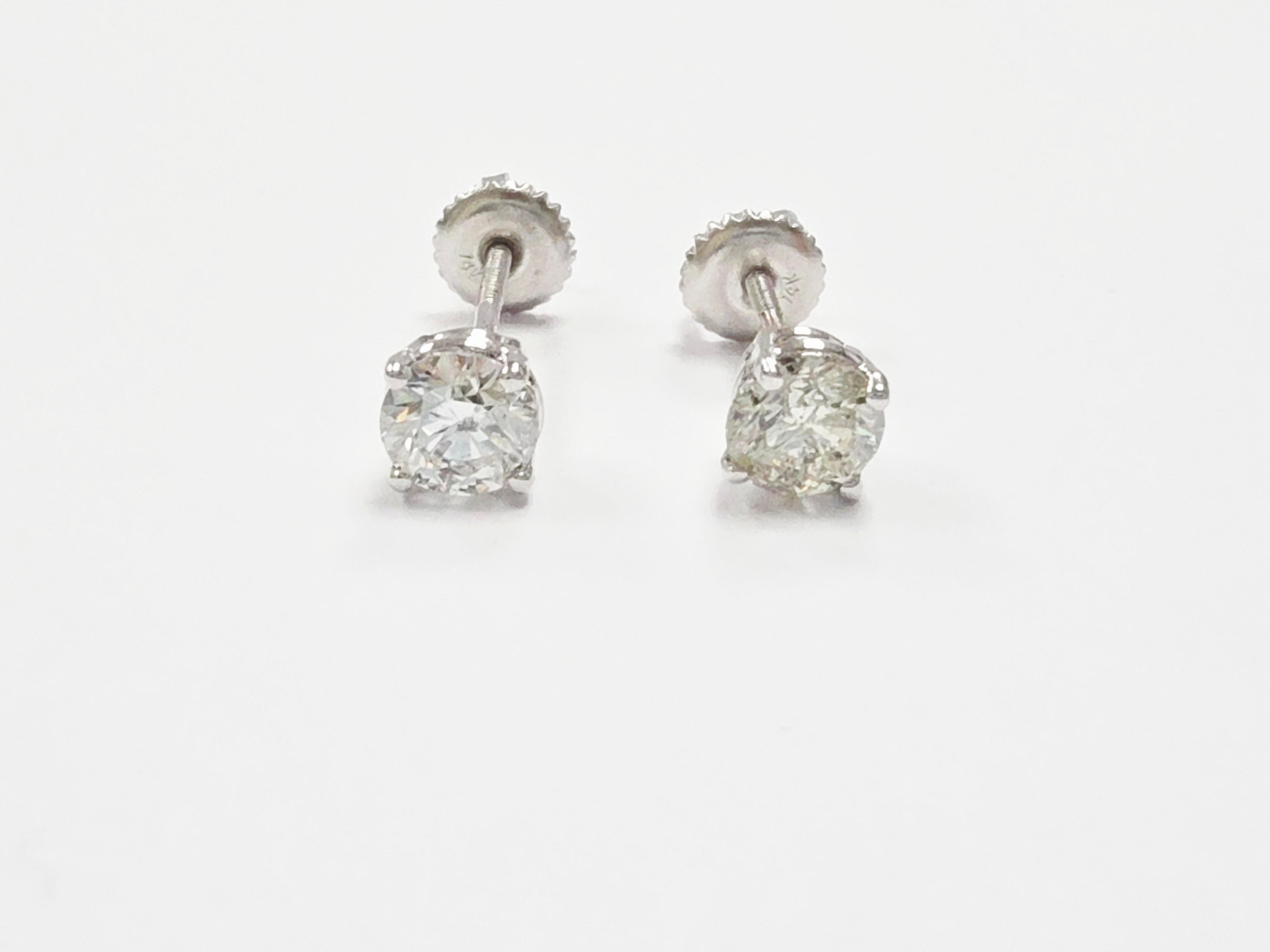 1.18 Carat Natural Diamond Round Stud Earrings in 14K White Gold

Add timeless elegance to your jewelry collection with these beautiful 1.18 carat natural diamond stud earrings. Each earring features a brilliant round-cut diamond, set in lustrous