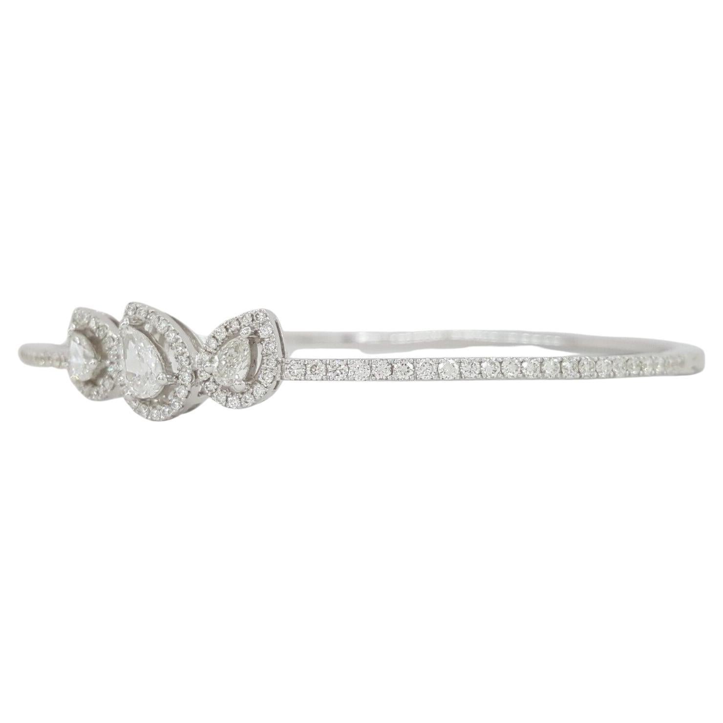 1.18 ct total weight Pear & Round Brilliant Cut Diamond Straight Line Station Bangle Bracelet 18K White Gold. 



