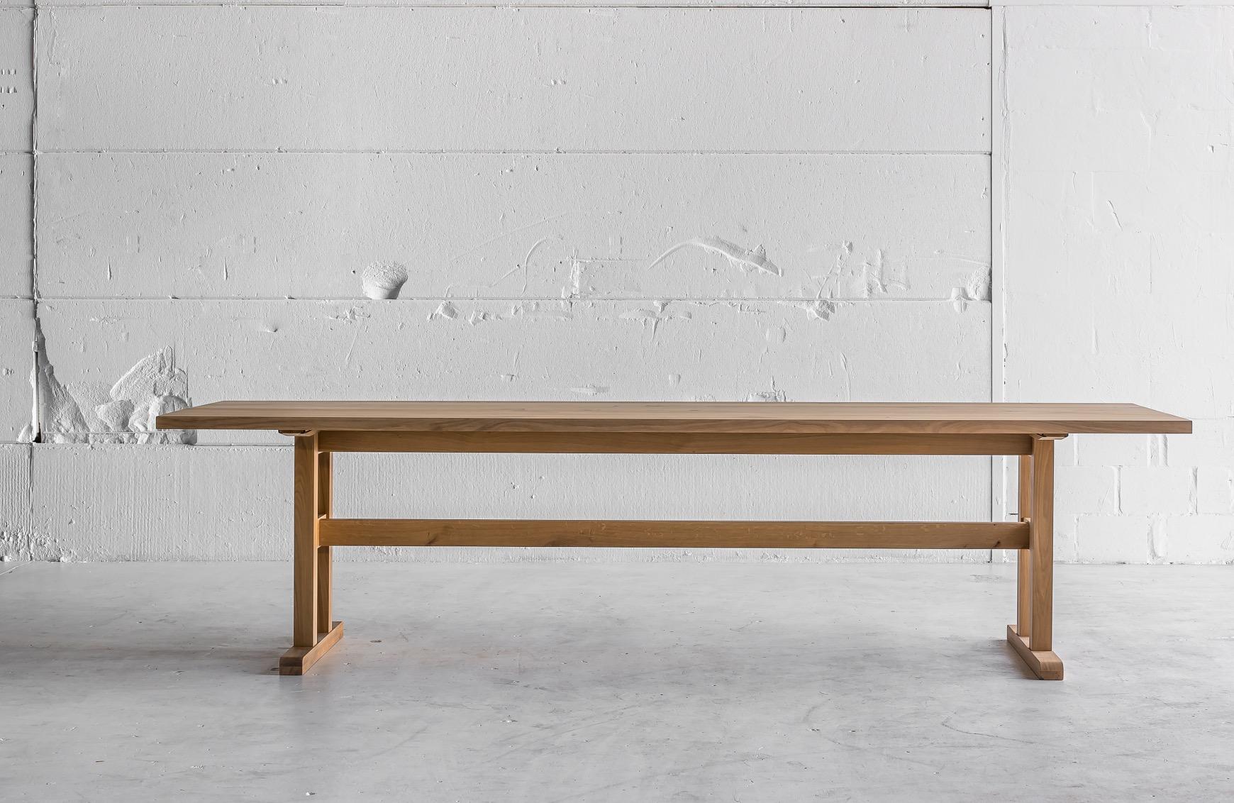IN STOCK AND AVAILABLE NOW.
Solid Oak Belgian dining table featuring a modern design, clean shapes and a sculptural base. This traditional Belgian table is handmade from long-lasting french oak. A table to grow old with and share stories around. It