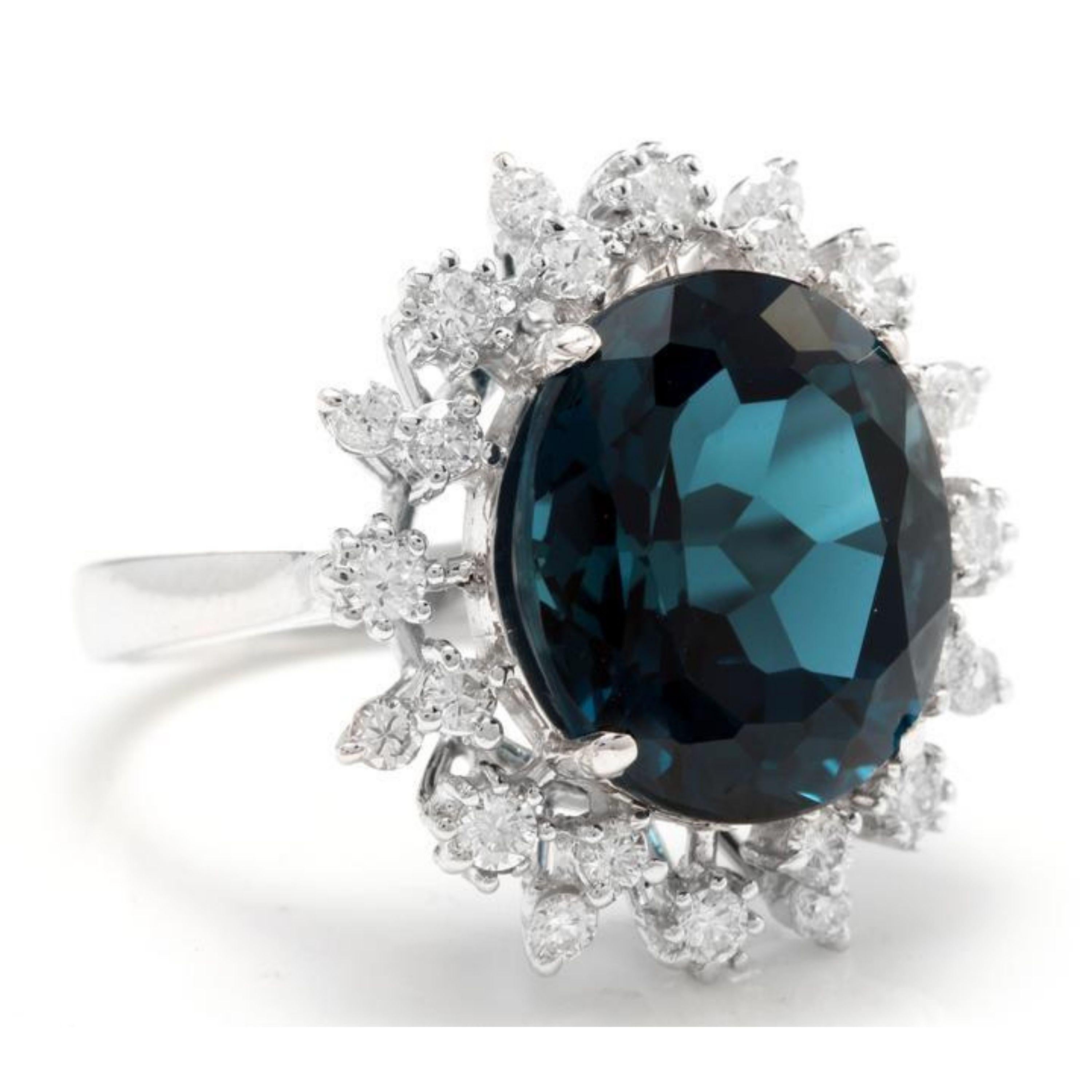 11.80 Carats Exquisite London Blue Topaz and Diamond 14K Solid White Gold Ring

Total Topaz Weight is Approx. 11.00 Carats

Topaz Measures: Approx. 14.00 x 12.00mm

Topaz Treatment: Heating, Irradiation

Natural Round Diamonds Weight: Approx. 0.80
