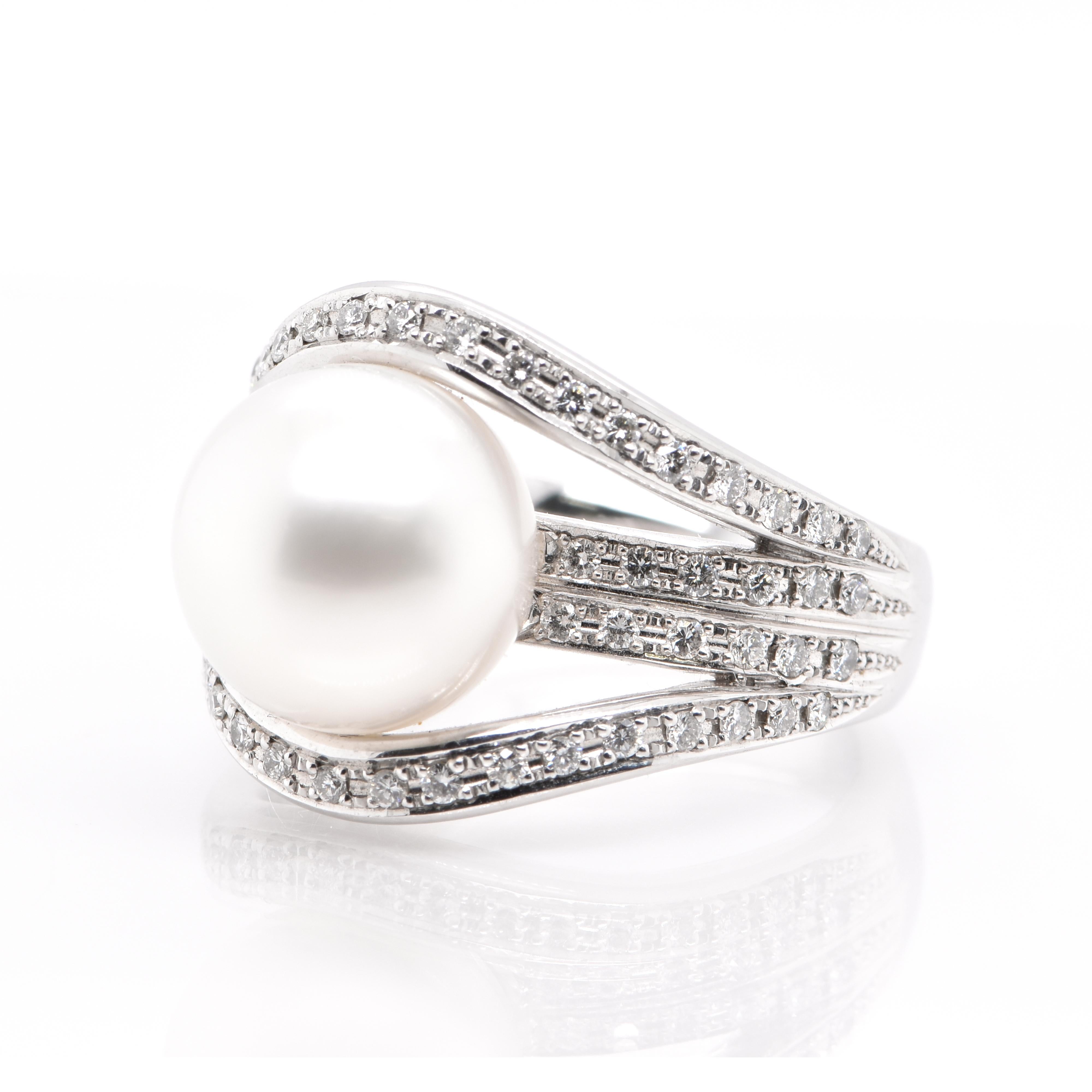 A stunning Cocktail Ring featuring a 11.80 mm, Japanese Akoya Pearl and 0.60 Carats of Diamond Accents set in Platinum. People have admired Pearls for thousands of years. It was Kokichi Mikimoto of the Mikimoto Brand that began marketing cultured
