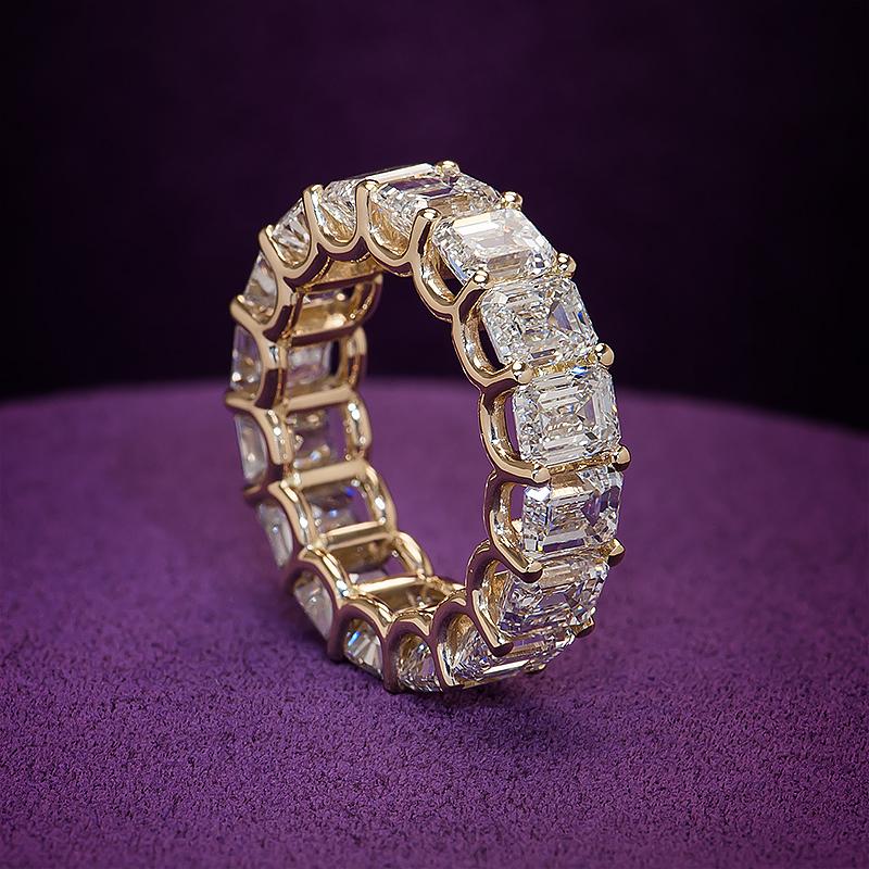 Presenting the Parabolic Diamond Eternity Ring, a truly exquisite modification of the classic eternity band. This unique design features delicate, parabolic waves of 18k yellow gold that are precisely measured to enhance the natural brilliance of