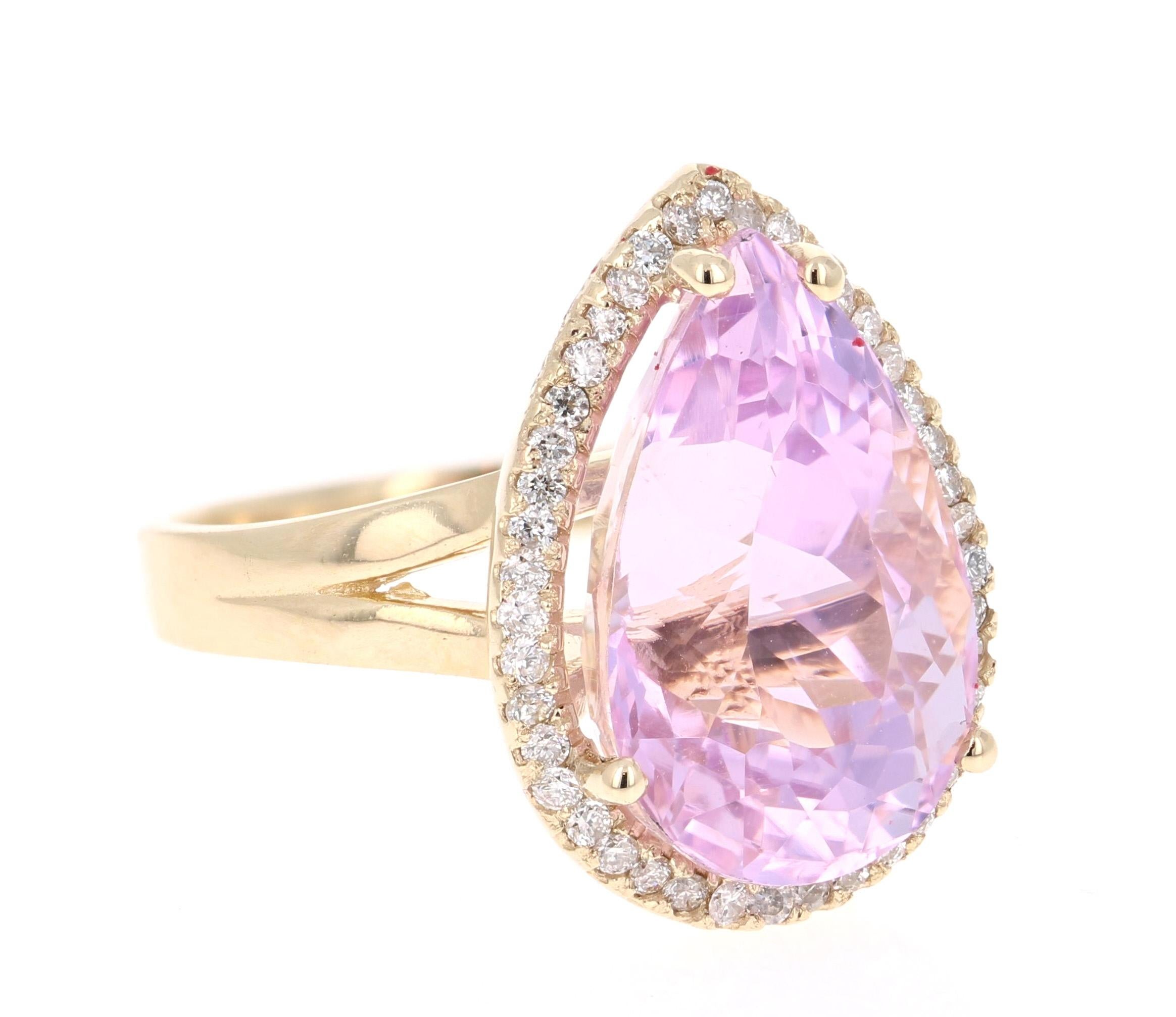 A lovely Engagement Ring Option or as an alternate to a Pink Diamond Ring! 

This simply stunning Kunzite Diamond Ring has a 11.46 Carat Pear Cut Kunzite as its center and has a beautiful simple halo of 42 Round Cut Diamonds that weigh 0.37 carats