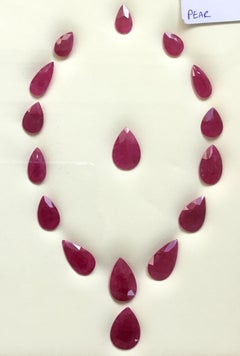 118.36 Carats Ruby Mozambique Pear Faceted Cut stone Layout Heated Natural Gem