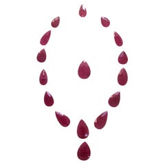 118.36 Carats Ruby Mozambique Pear Faceted Cut stone Layout Heated Natural Gem