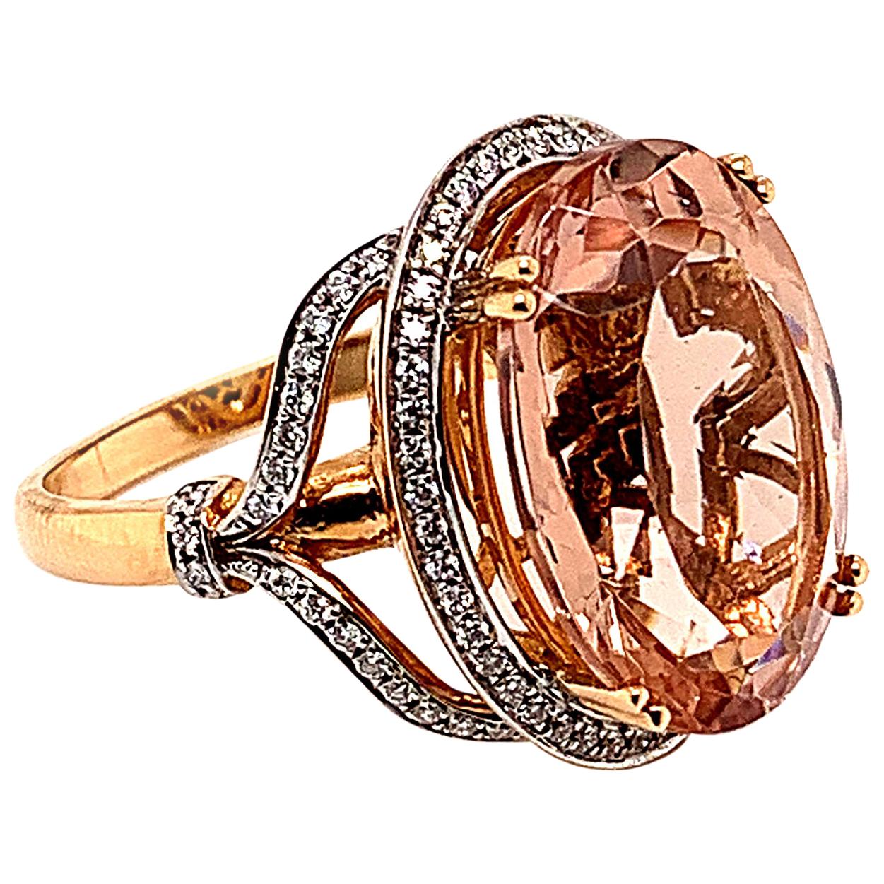 11.84 Carat Oval Shaped Morganite Ring in 18 Karat Rose Gold with Diamonds For Sale